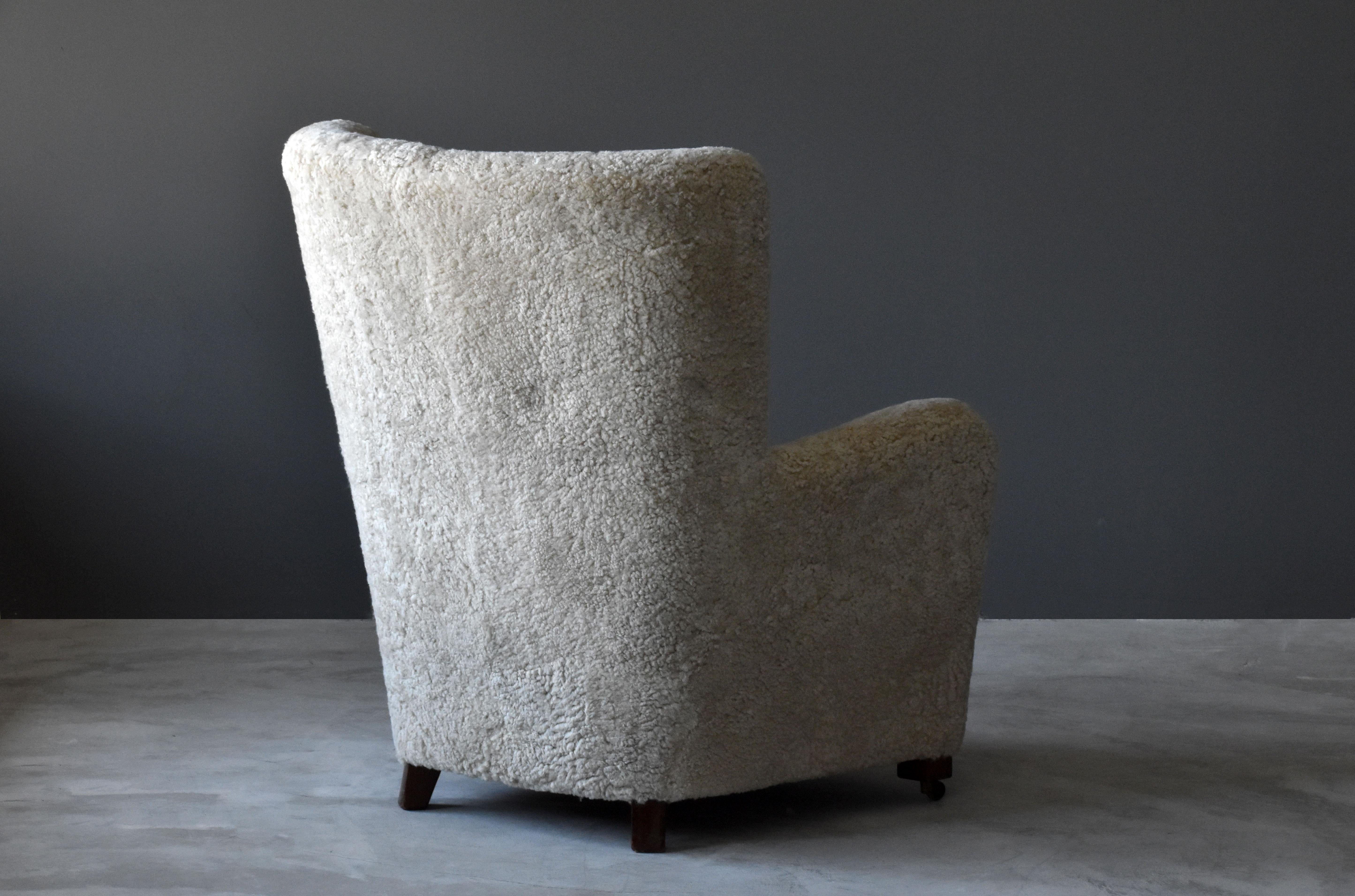 Danish Jacob Kjær, Attribution High-Back Lounge Chair, Sheepskin, Denmark, 1940s