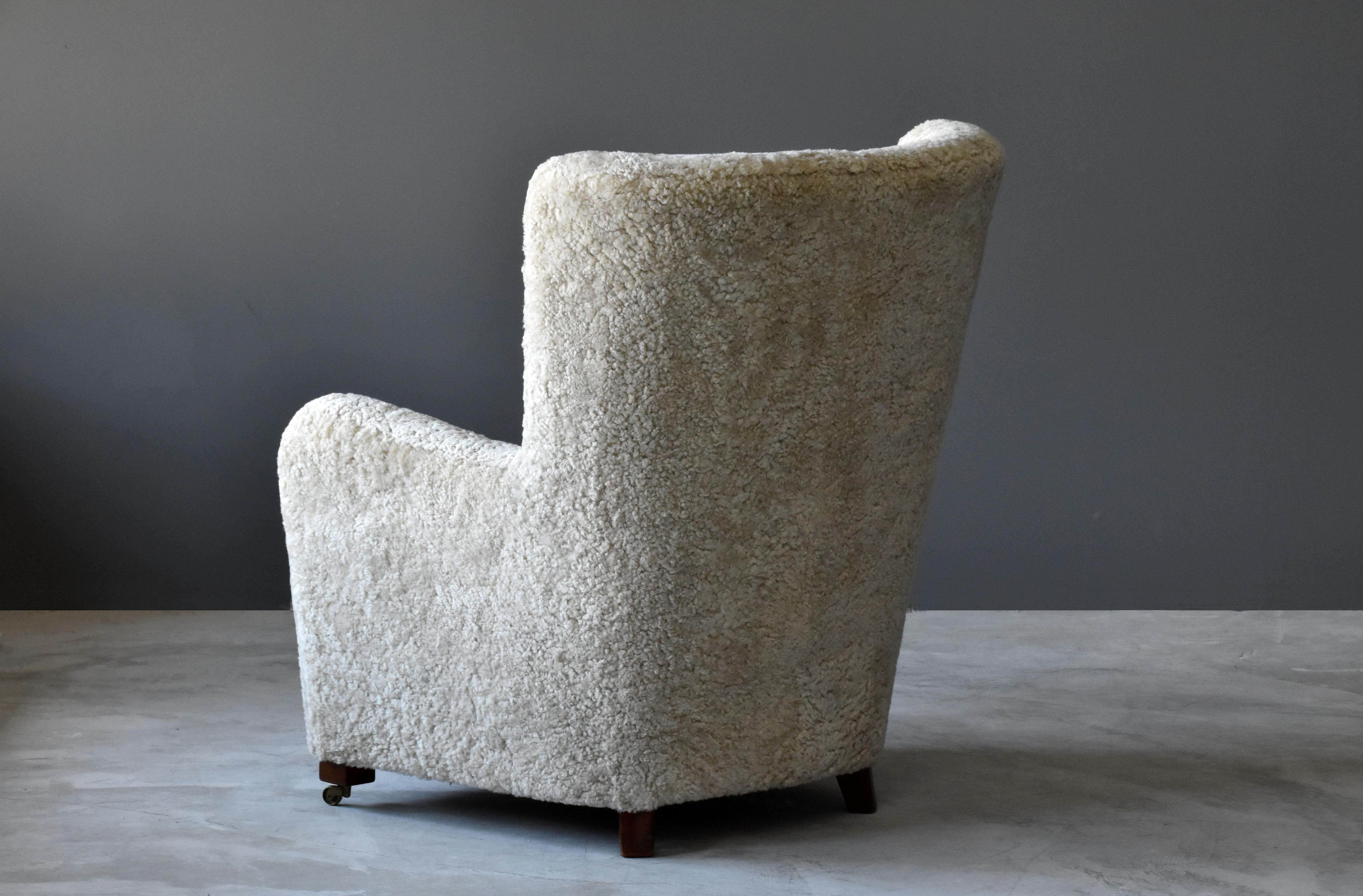 Jacob Kjær, Attribution High-Back Lounge Chair, Sheepskin, Denmark, 1940s In Good Condition In High Point, NC