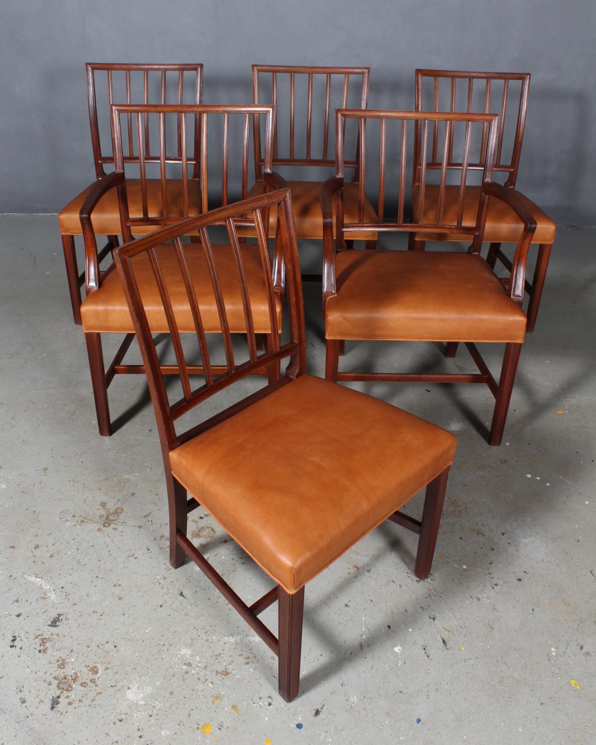 Jacob Kjær six chairs new upholstered with vintage tan aniline leather.

Frame of Cuba mahogany.

Model Pariser stolen designed for the world exhibition in 1937 in Paris, made by Jacob Kjær.

