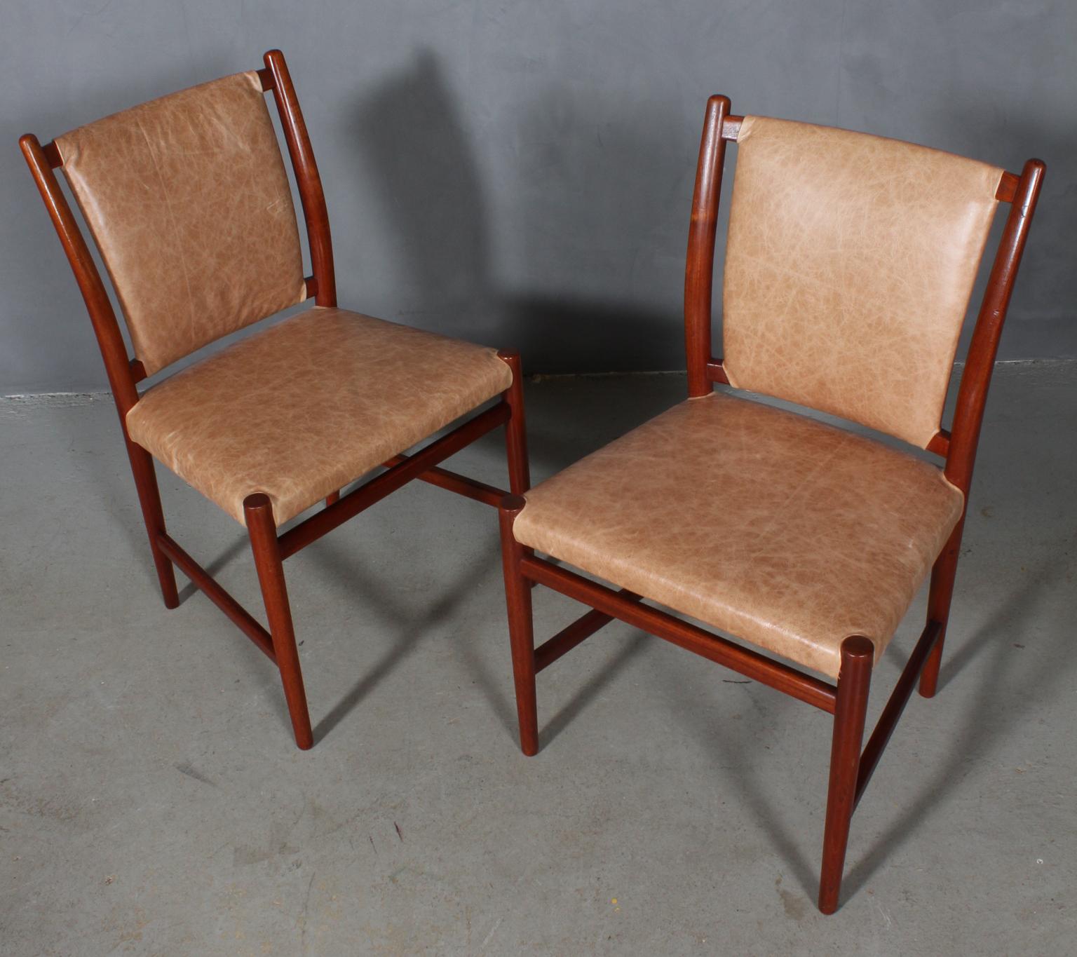 Jacob Kjær two chairs upholstered with light brown leather.

Frame of teak

Model A-49 chair.
 
    