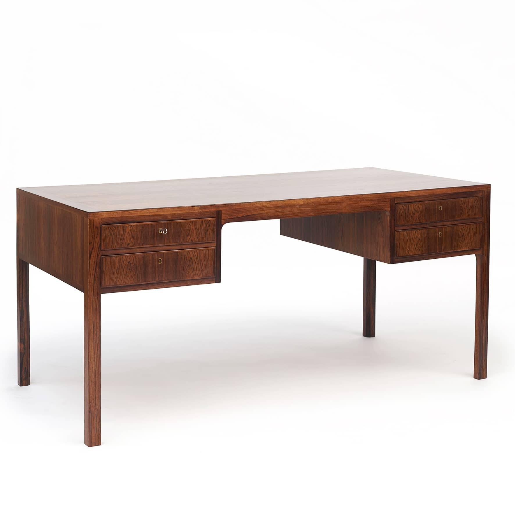 Jacob Kjær 1896-1957.
A freestanding Jacob Kjær Walnut desk.
Front features four drawers.
An elegant and beautiful desk with fine details. The build quality and materials are of the highest quality. The attention to detail is reflected in the