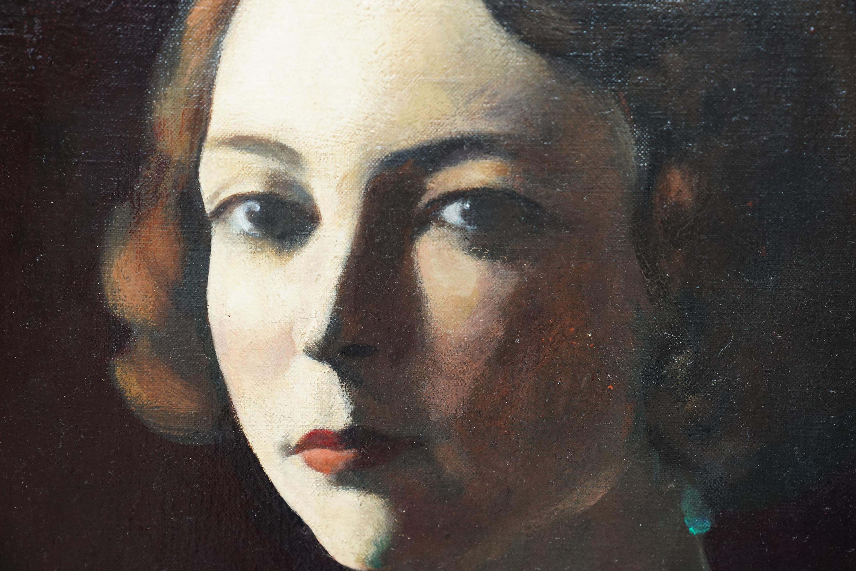 This enigmatic 1920's Art Deco Slade School portrait oil painting is by noted Russian born British artist Jacob Kramer. Painted circa 1922 it is a seated portrait of Miss Hilda Wilkinson. She is wearing an off the shoulder green dress and pearls