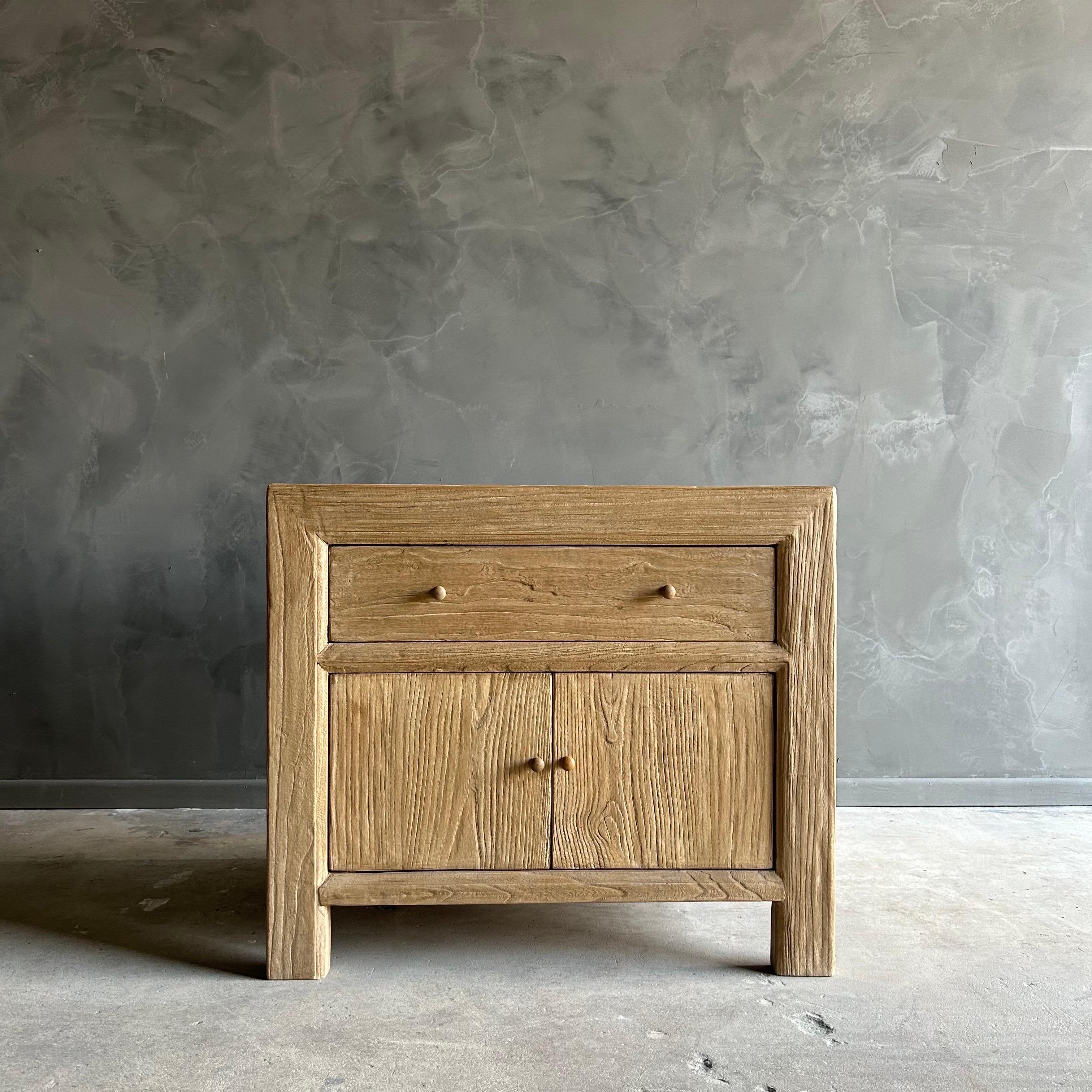 The Jacob Nightstand is a charming bedside storage solution. The two-doored cabinet offers both convenience and function, while a divided interior provides ample storage space to hold your most reached for items. Due to the reclaimed wood material,