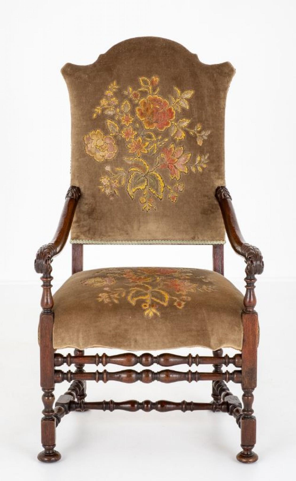 Oak Jacobean style arm chair.
This chair is raised upon ring turned front legs with ring turned stretchers and an 