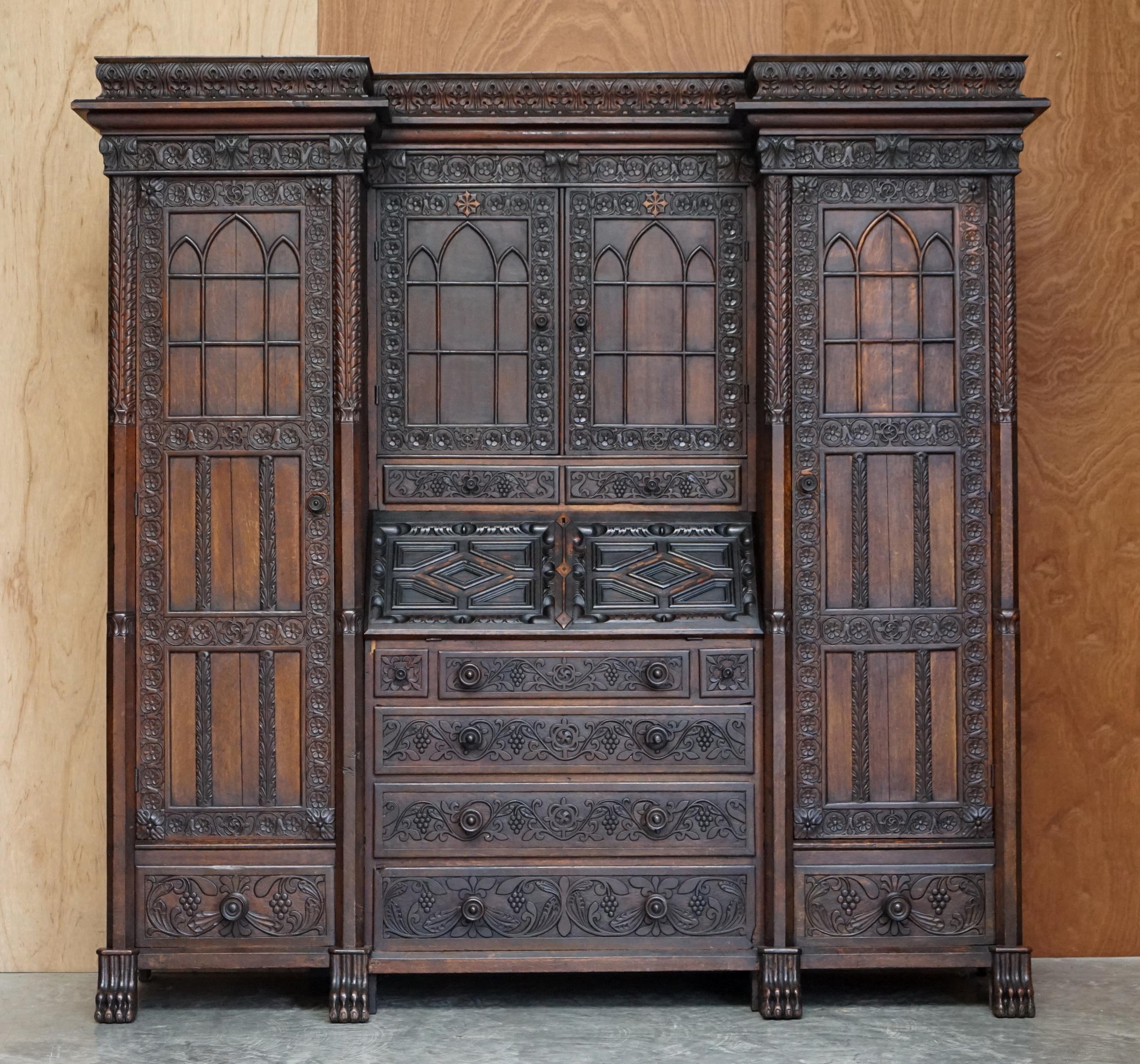 We are delighted to offer this very rare and highly collectable, ornately carved, 1833 dated Jacobean revival Antique Library Bureau bookcase

This unit can be dismantled into a few very easy to install pieces, ideal for transport and tricky home