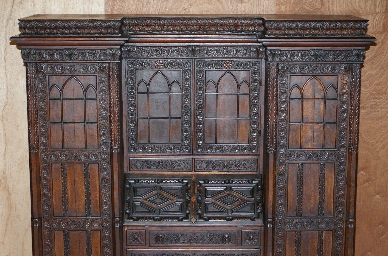 European Jacobean Revival Antique 1833 Dated Hand Carved English Oak Bureau Bookcase For Sale