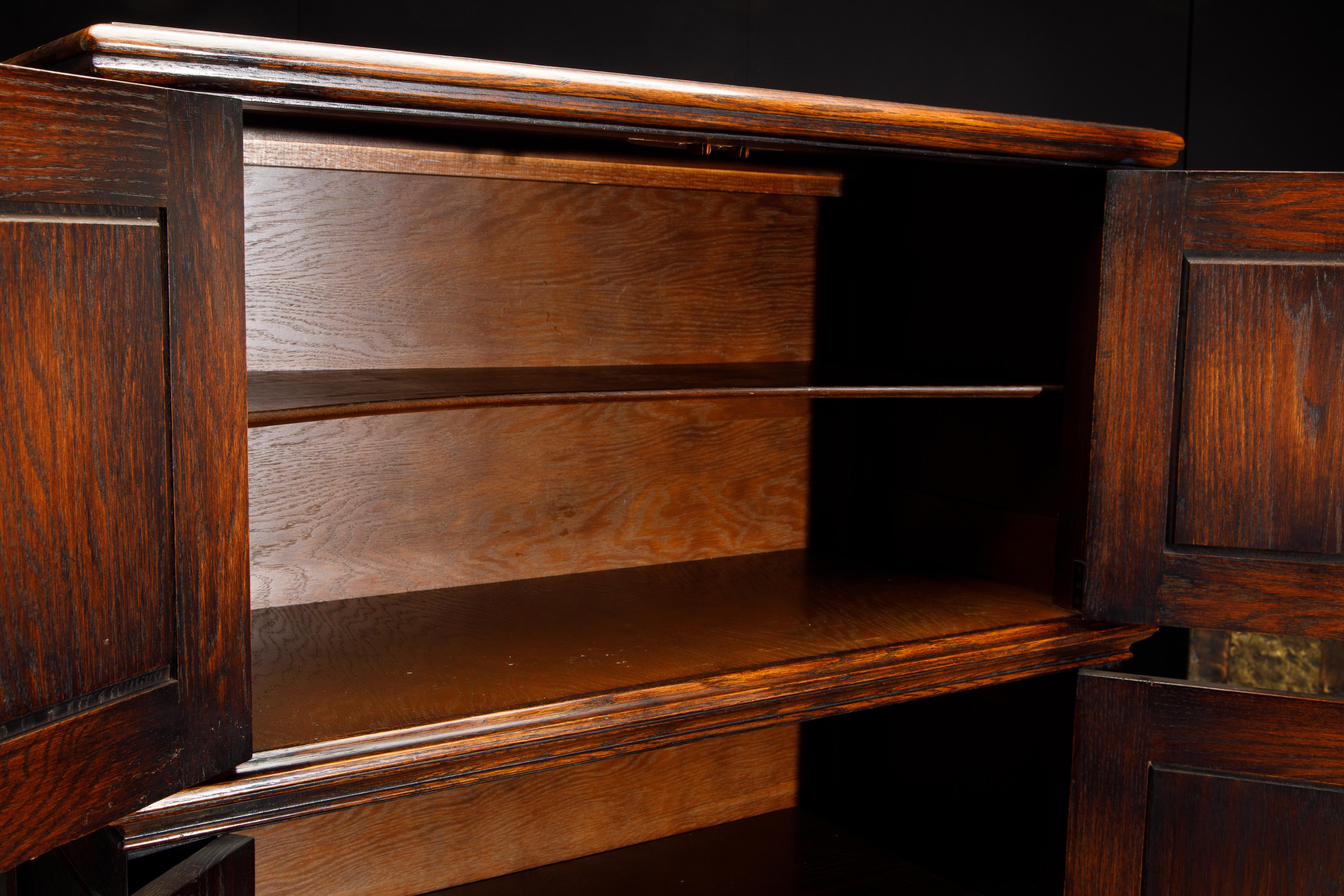 Jacobean Revival Carved Oak Highboy Cabinet In Fair Condition In Los Angeles, CA