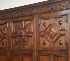 Jacobean Revival Carved Oak Triple-Door Wardrobe