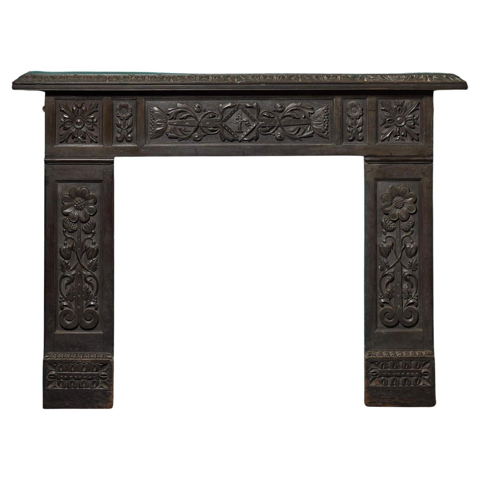 Jacobean Style Carved Dark Oak Fire Mantel For Sale