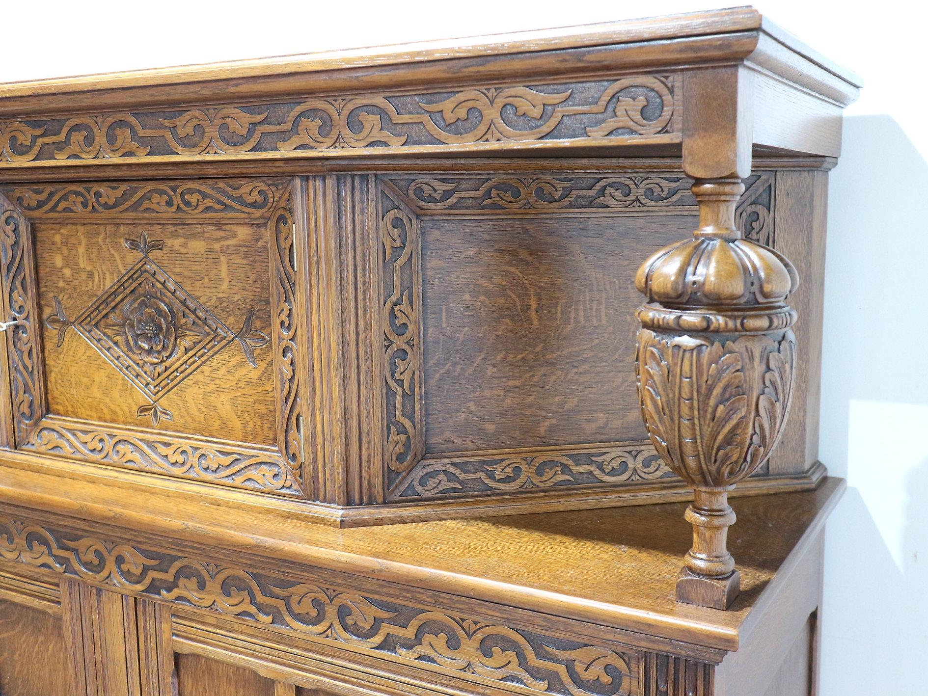 British Jacobean Style Carved Oak Court Cabinet Cupboard For Sale