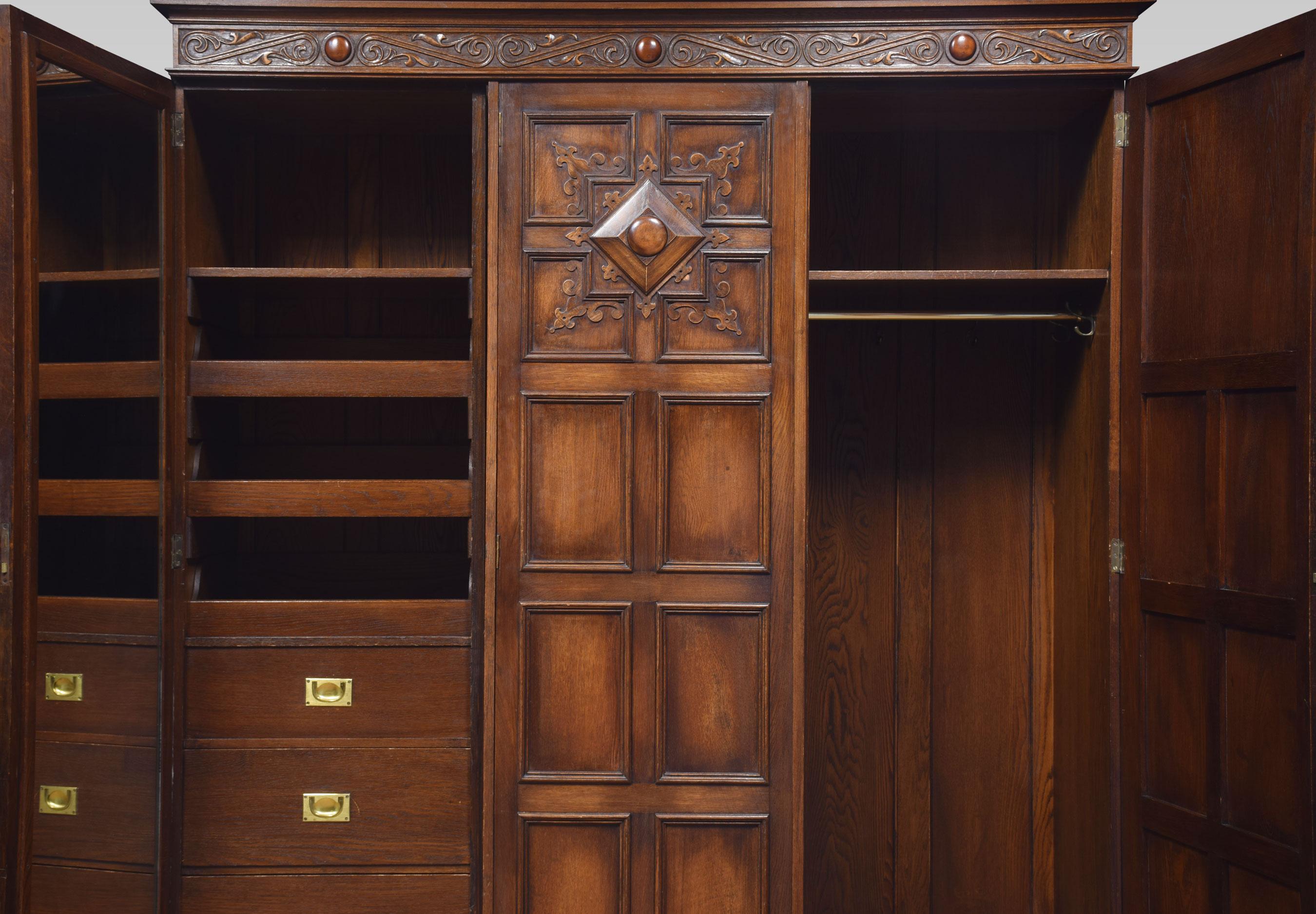 British Jacobean Style Carved Oak Three-Door Wardrobe