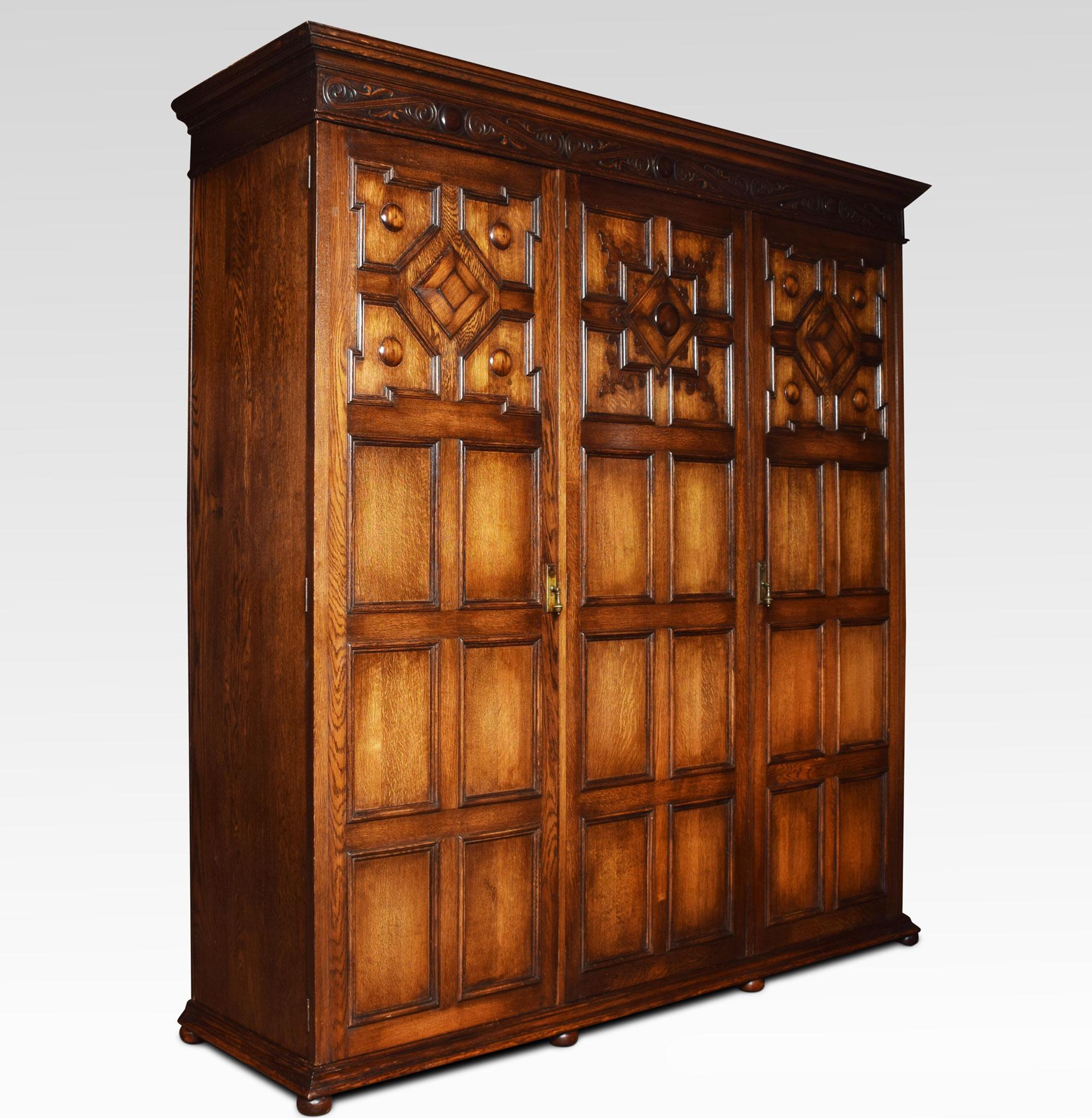 British Jacobean Style Carved Oak Three-Door Wardrobe
