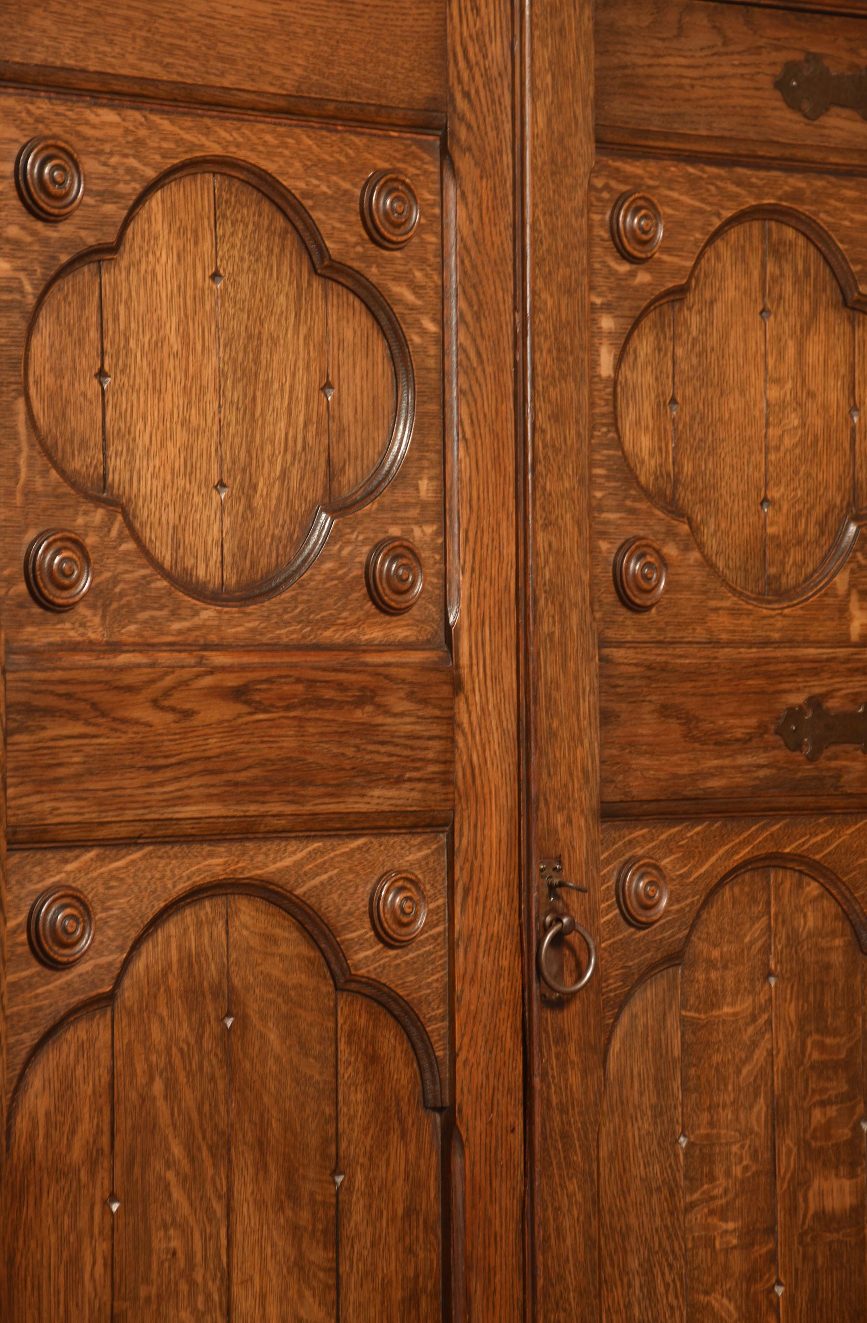 Jacobean style carved oak three door wardrobe For Sale 3
