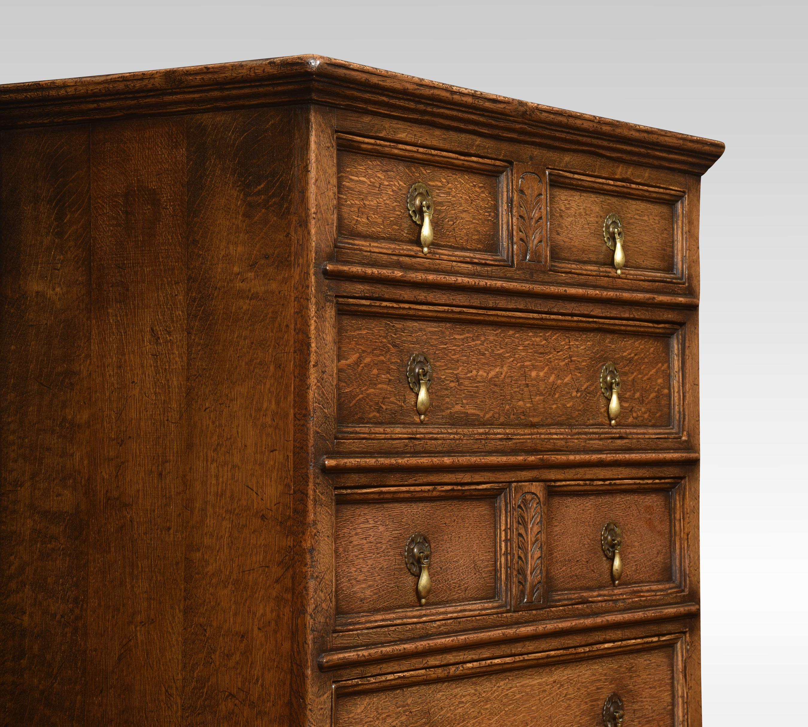 Jacobean style chest on chest, the solid oak rectangular top above two short and five long graduated drawers fitted with brass drop handles. All raised up on bracket feet.
Dimensions
Height 55.5 inches
Width 31 inches
Depth 17.5 inches.