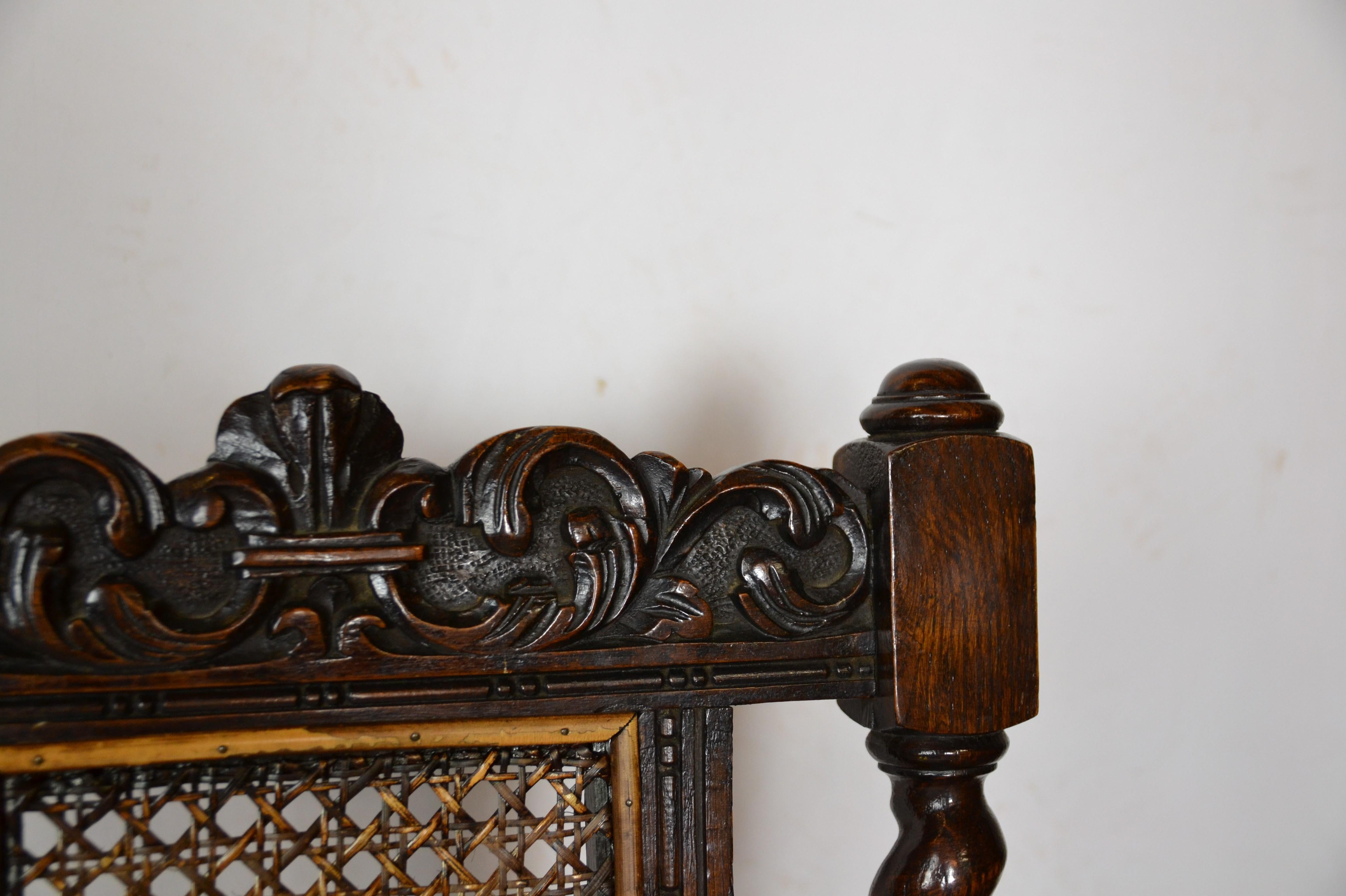 Set of six English Jacobean style dining chairs. The seats are covered in light grey-blue linen. Measures: Armchairs: 24