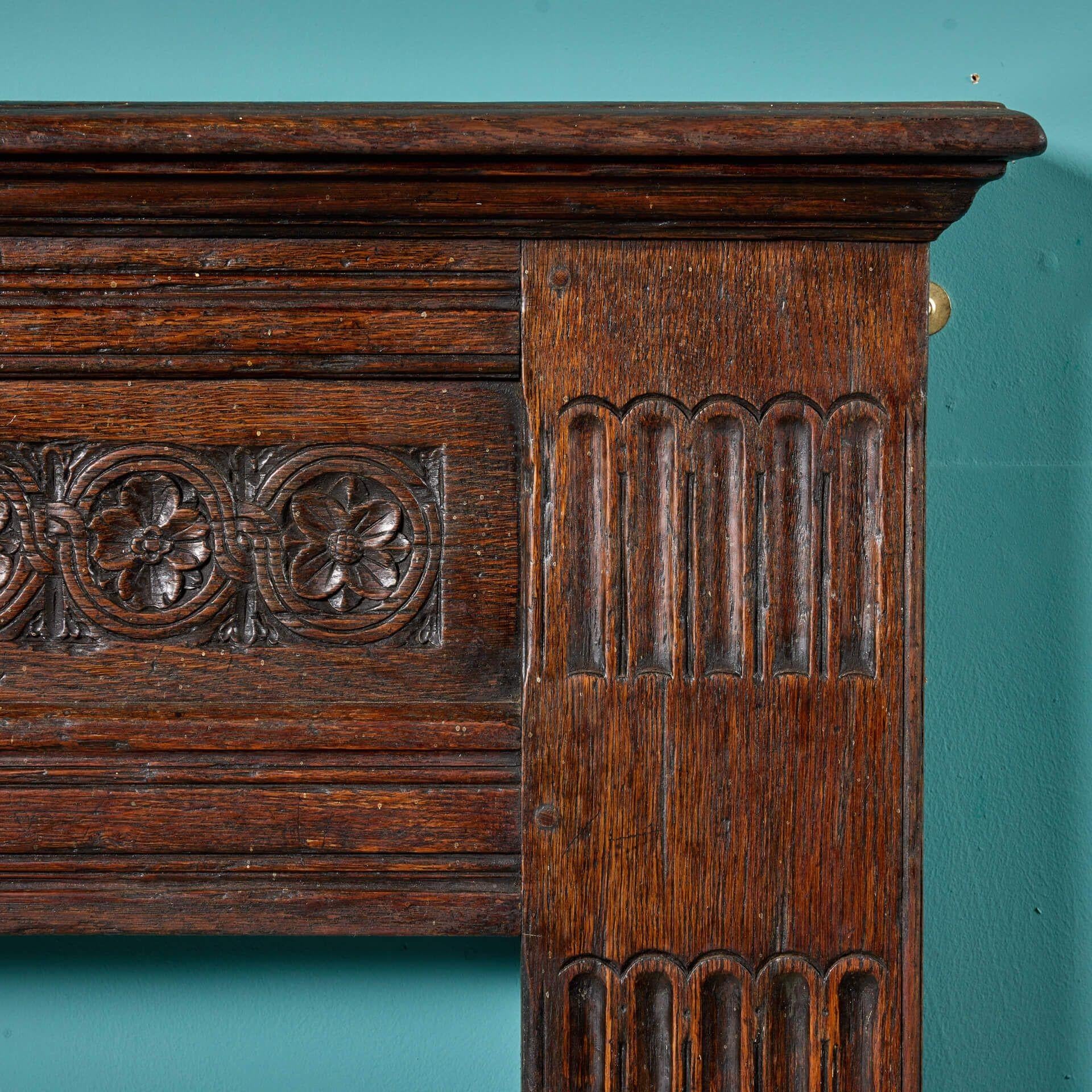 Carved Jacobean Style English Oak Fire Mantel For Sale
