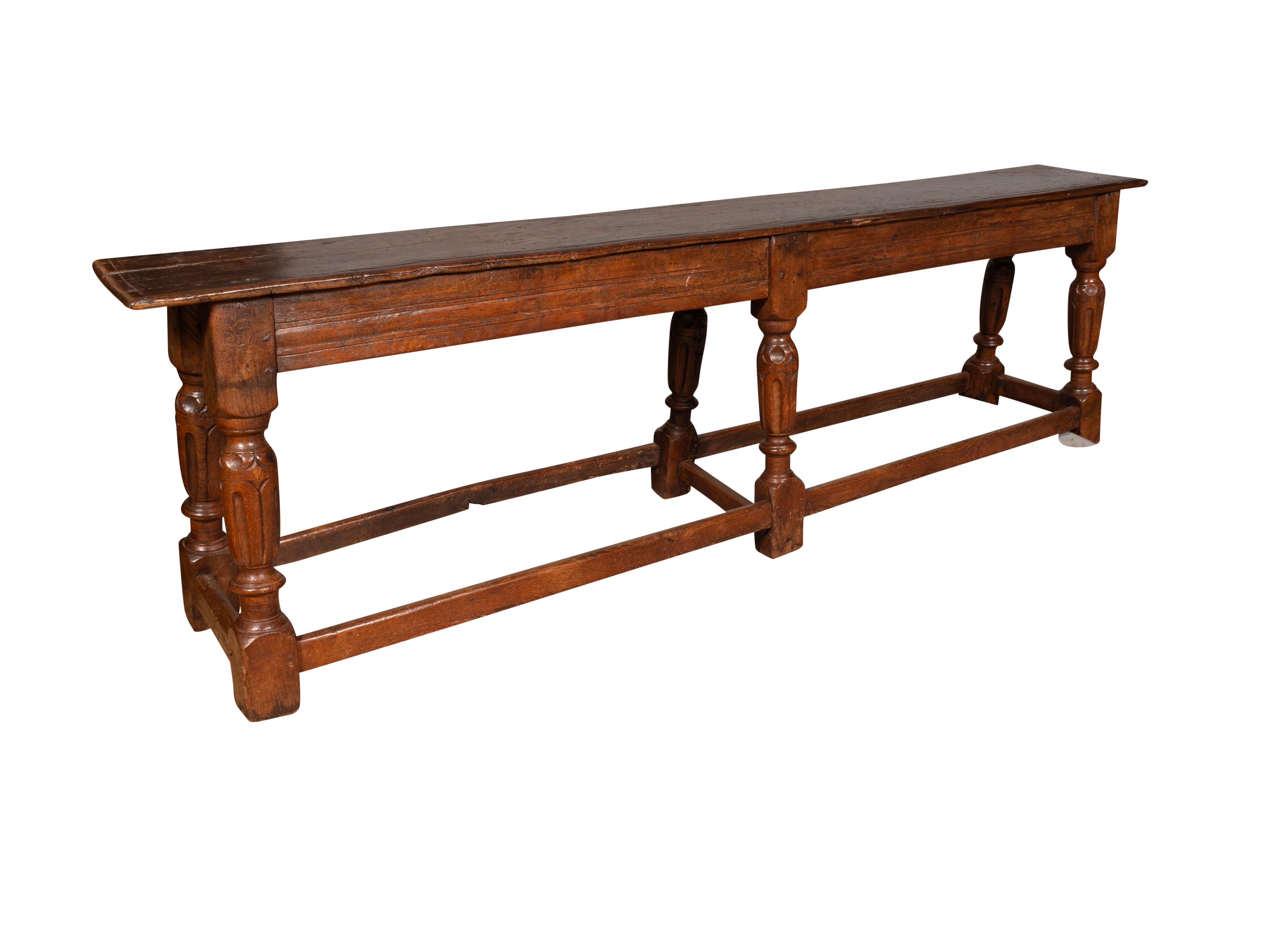 Late 19th Century Jacobean Style Oak Bench For Sale