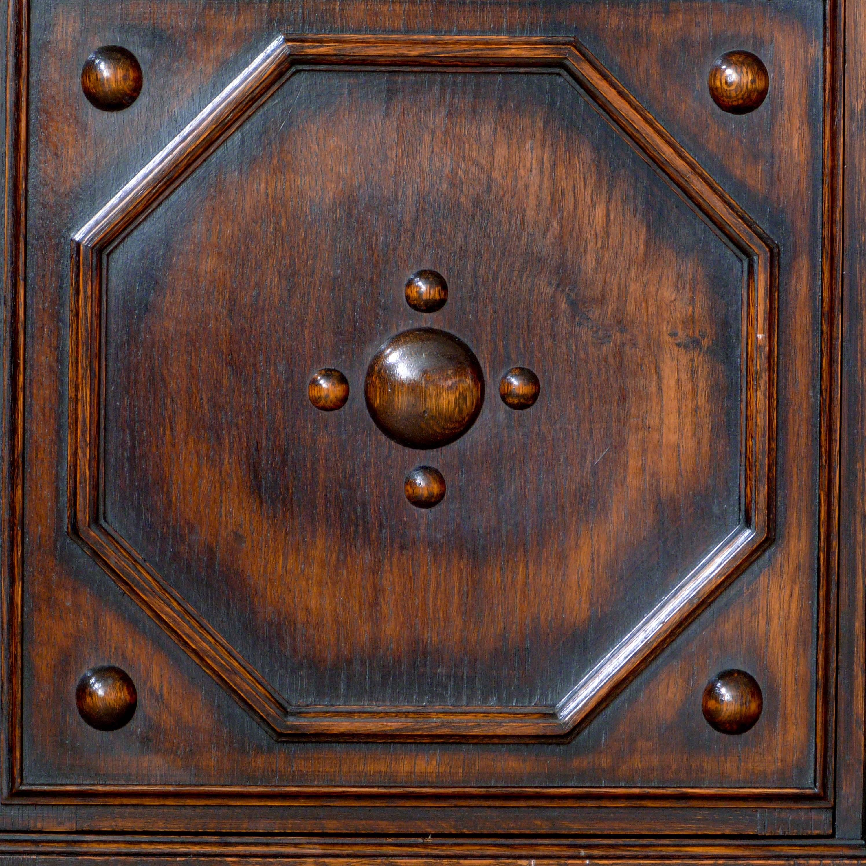 Carved Jacobean Style Oak Bookcase For Sale