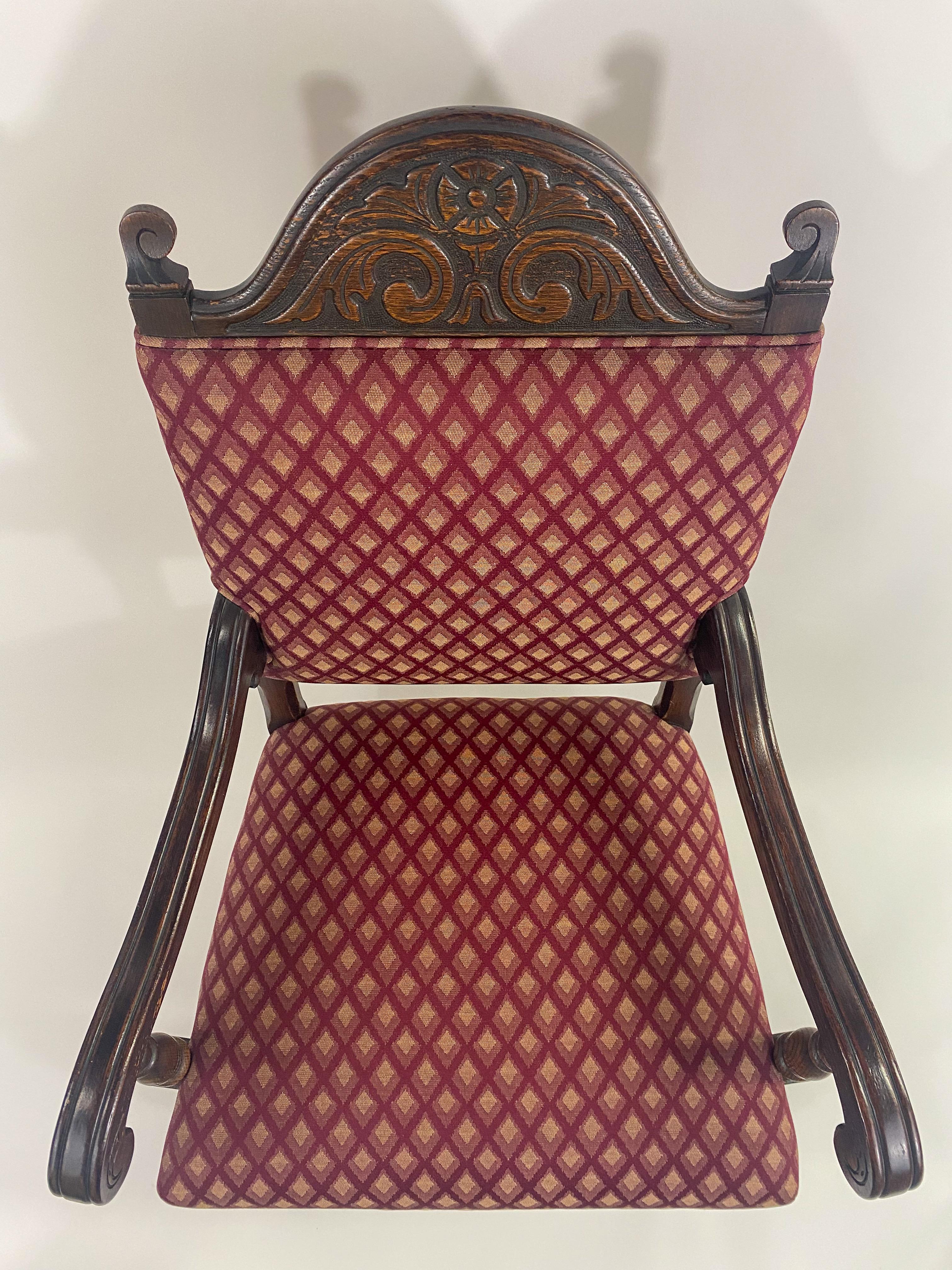 20th Century Jacobean Style Oak Carved Berger or Arm Chair with Red Upholstery, a Pair  For Sale