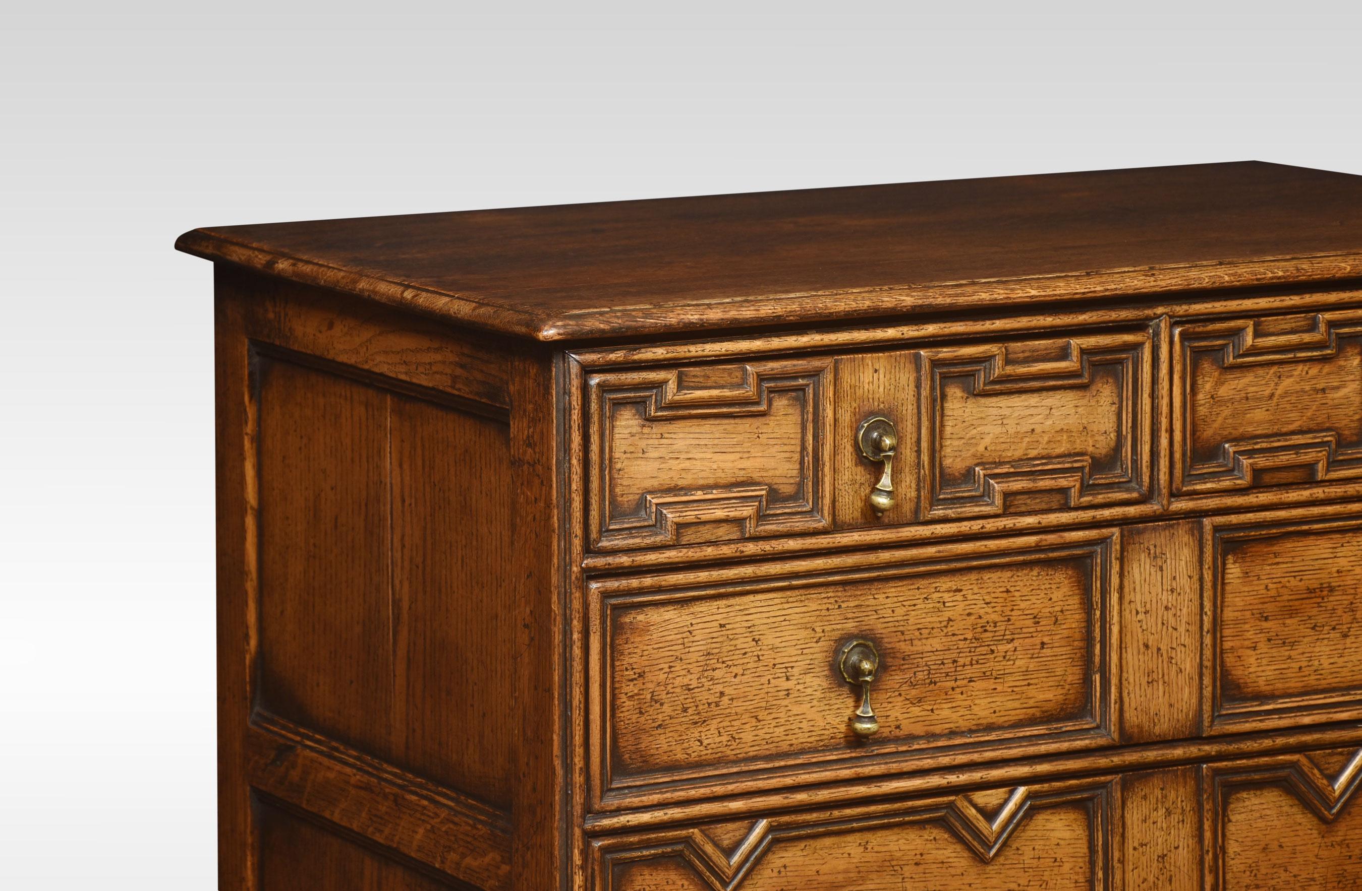 British Jacobean style oak chest of drawers For Sale