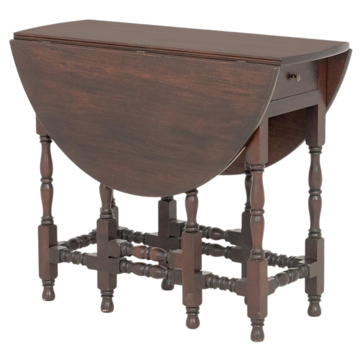Mesa con patas plegables y tablero abatible de palisandro, estilo jacobino, del siglo XIX