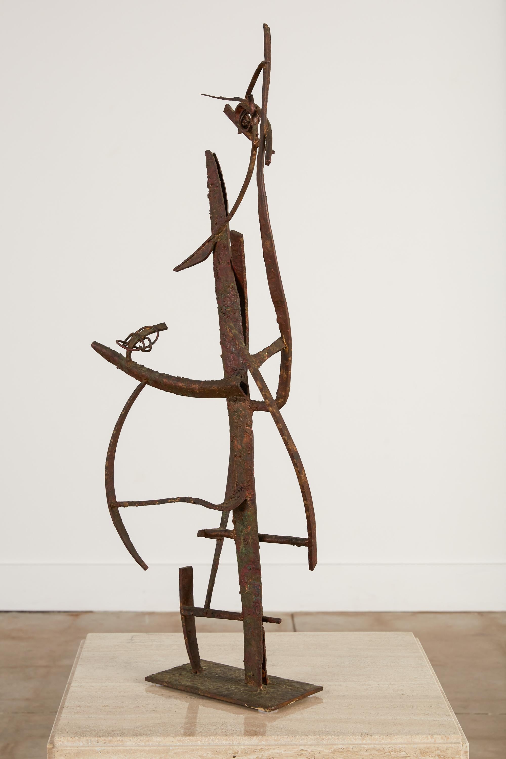 A large 1958 sculpture in welded steel, brass, bronze, and copper on a small plate mount by California-based artist Max Finkelstein. Entitled “Jacob’s Ladder,” the piece displays Finkelstein’s signature Kinetic energy and playful use of geometry.