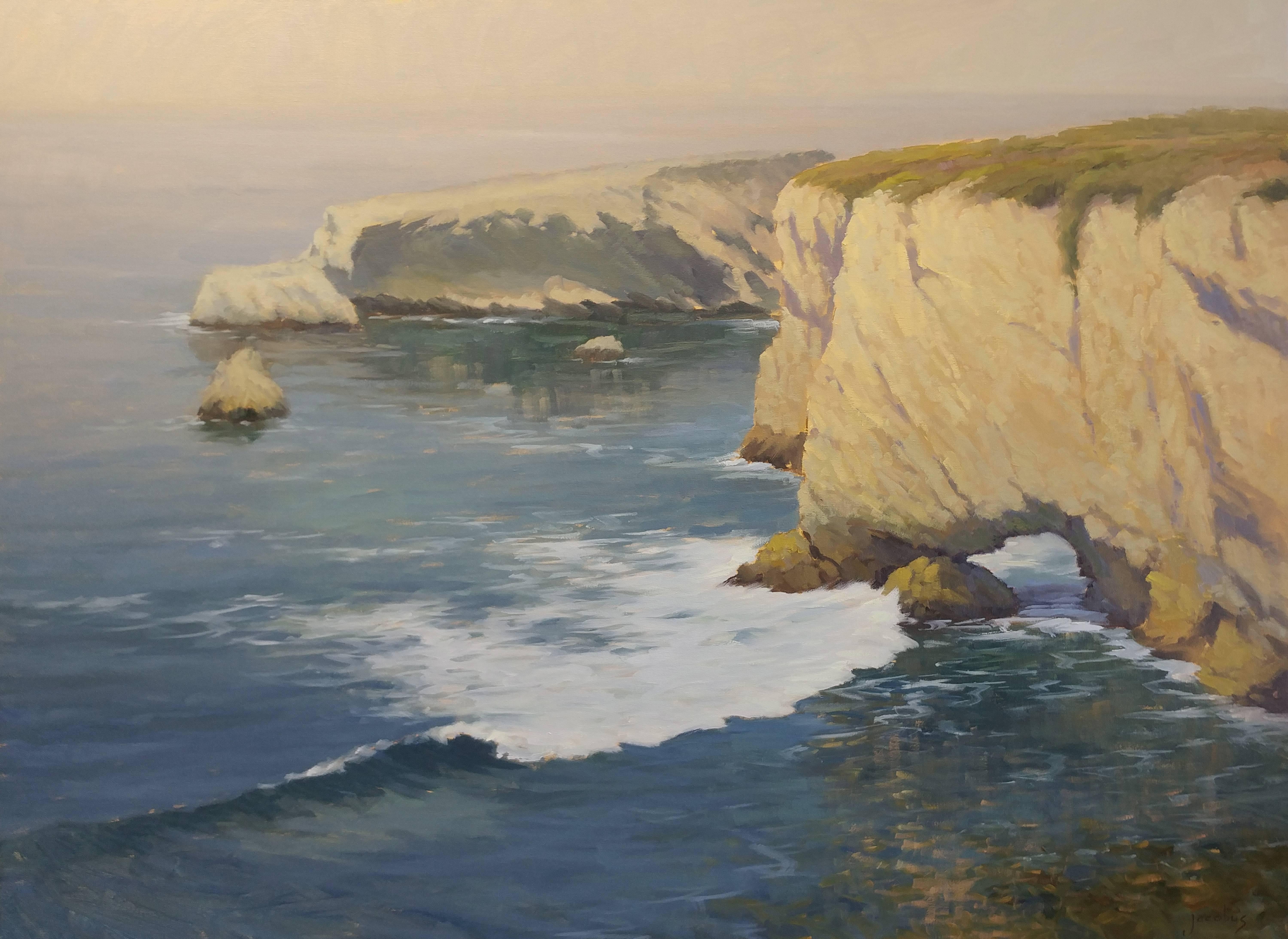 An atmospheric oil painted on location on the  Central Coast by noted California artist Jacobus Baas, this plein air painting "Golden Cliffs at Sunset," exhibits the subtle touch and beautiful light that the artist is known for.  Capturing the