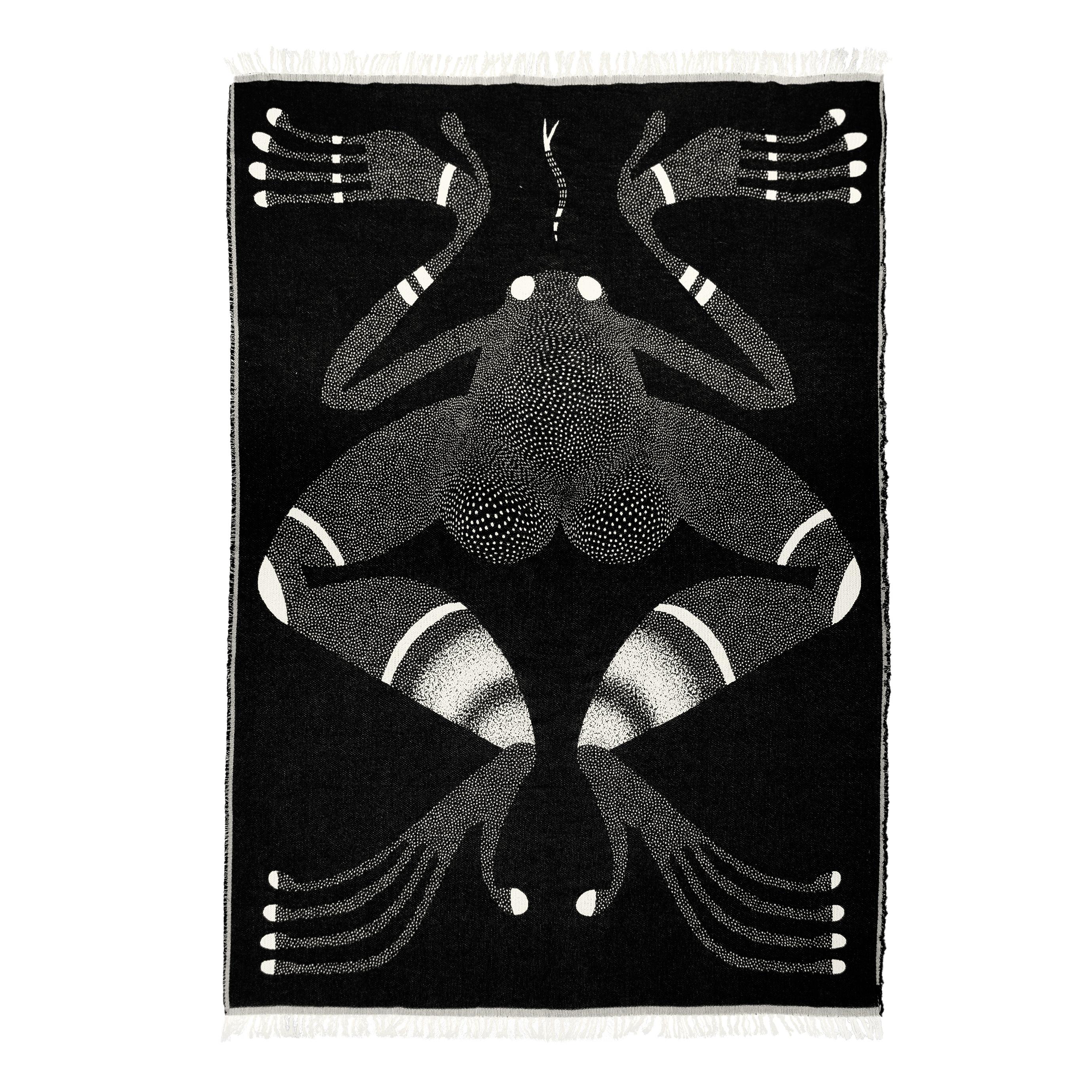 Beautiful cotton jacquard frog blanket by Barbara Janczak.

The Animals series includes soft cotton blankets and bedspreads with intriguing patterns with animal motifs. Or maybe human ones? The heroes of this series refer to Eastern iconography. The