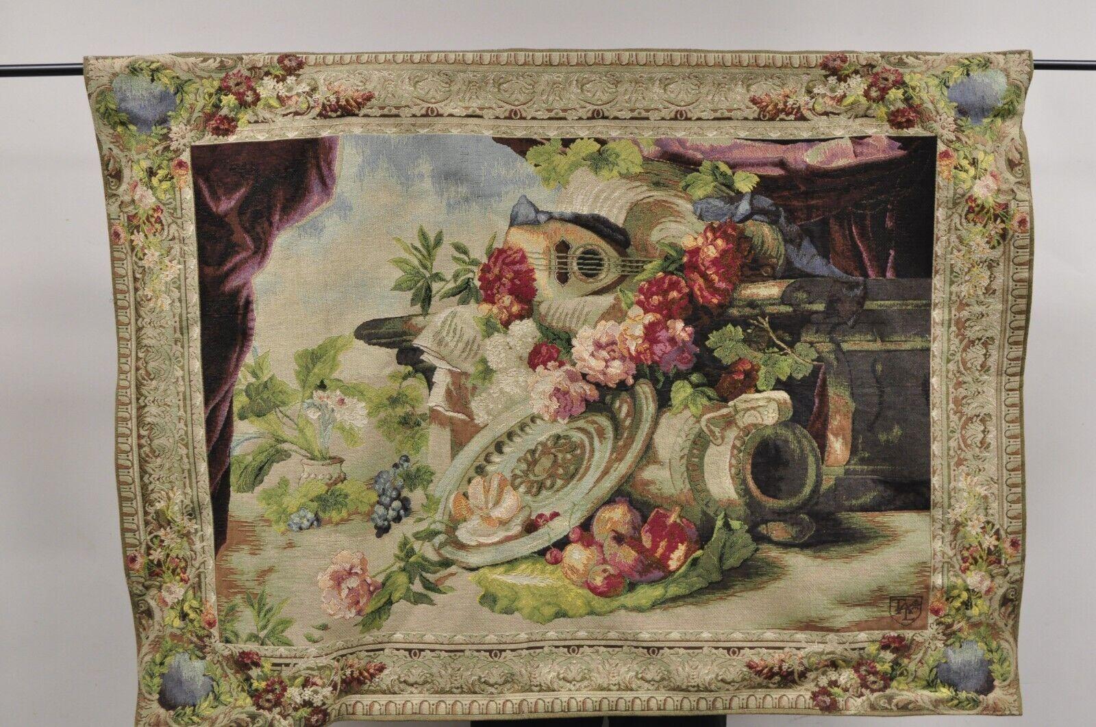 Jacquard Woven French Wall Tapestry Still Life Flowers & Mandolin by J&D. Item featured has an  Adjustable rod, ornate resin finials, very nice French style tapestry. Circa  21st Century, Pre-owned.
Measurements: 
Tapestry: 40