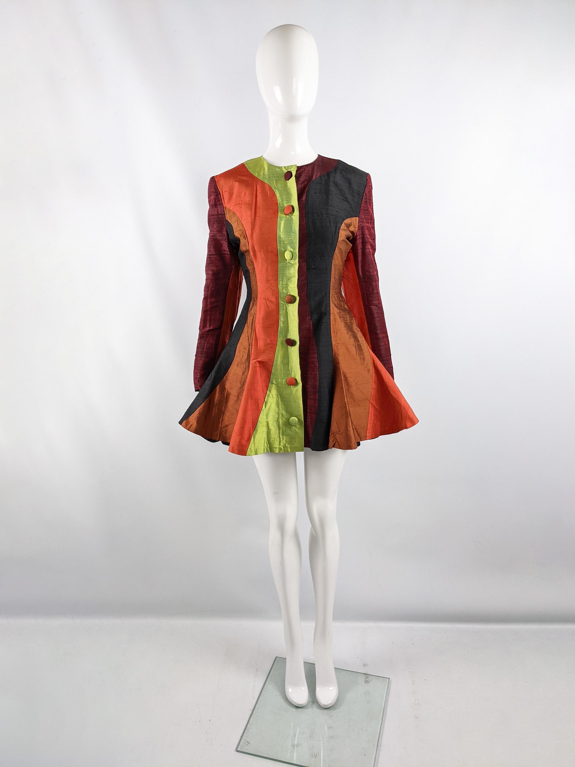 A fabulous vintage jacket from the Spring Summer 1992 collection by cult British fashion designer, Jacqueline Hancher known for her clubwear designs in the 80s and 90s alongside contemporaries like Pam Hogg and Katherine Hamnett. In a patchwork /