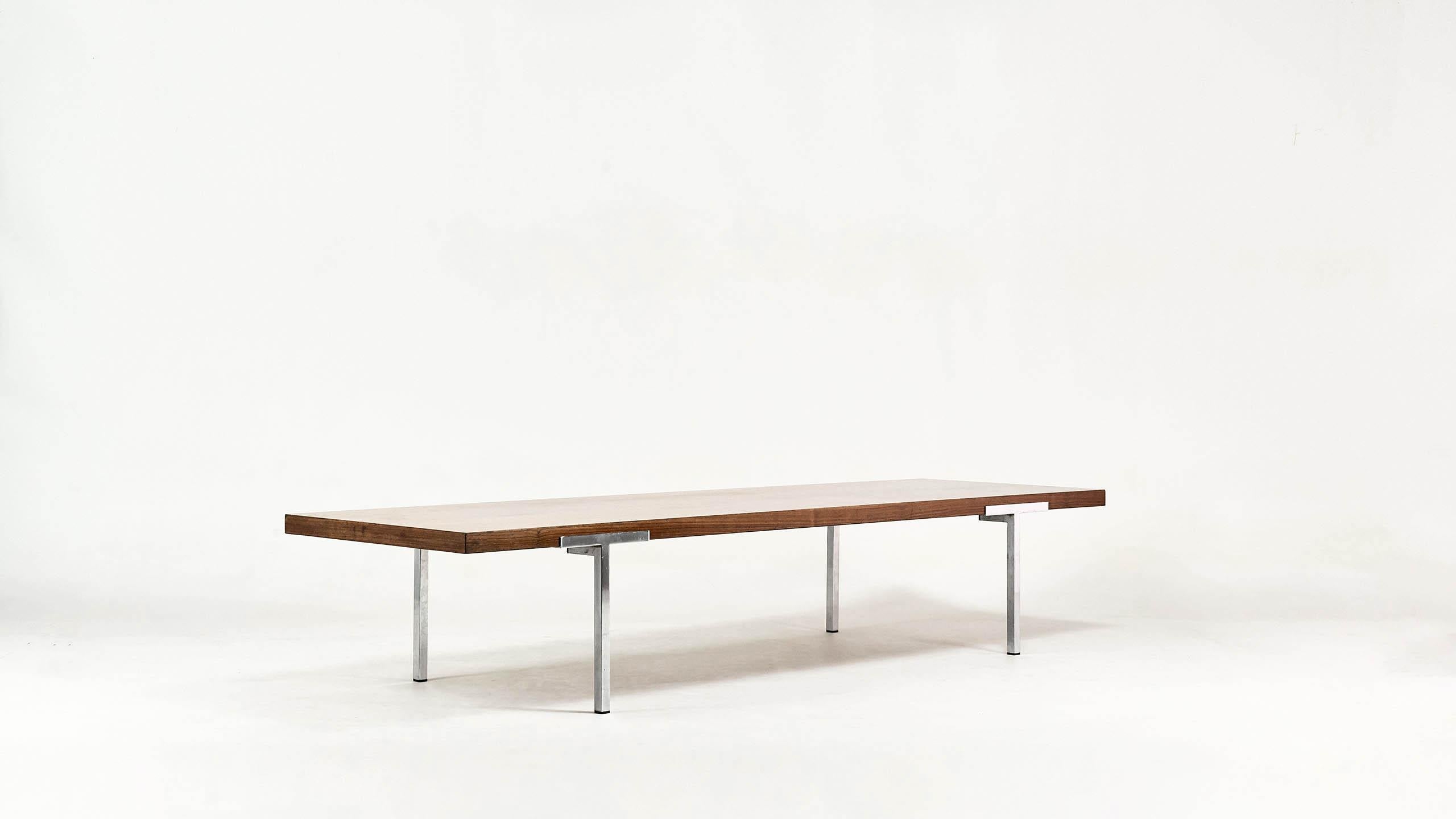 Modernist rectangular coffee table, by French designers Antoine Philippon & Jacqueline Lecoq for Laauser, circa 1960. Top in rosewood veneer supported by four chromed steel legs. Small traces of use, good general condition, 1960s.