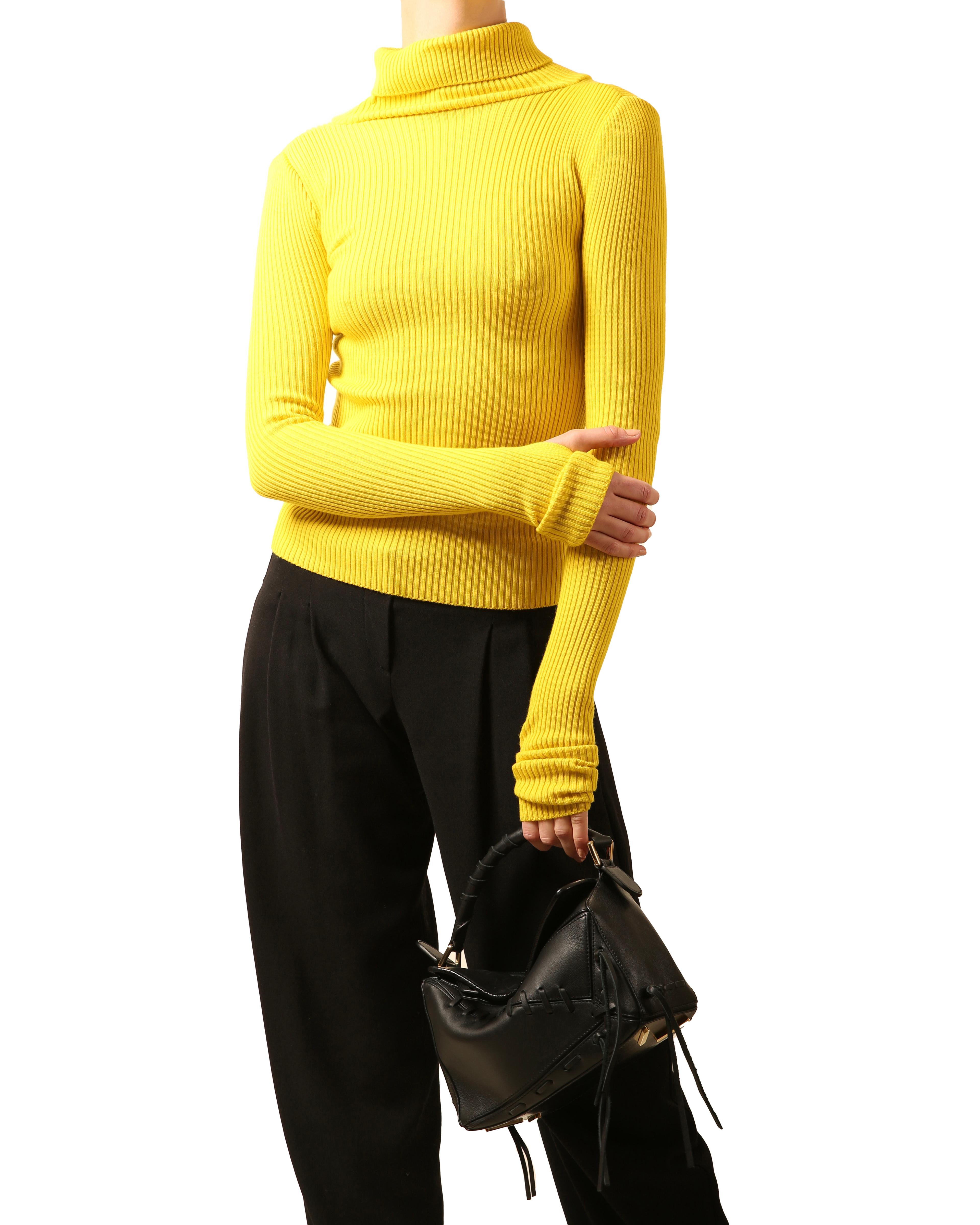 Jacquemus Fall 2016 skin tight bright yellow ribbed wide roll neck sweater
Slits to both arms 

Composition:
100% wool

Size:
FR 34

In excellent condition 

Measurements:
Shoulder 12