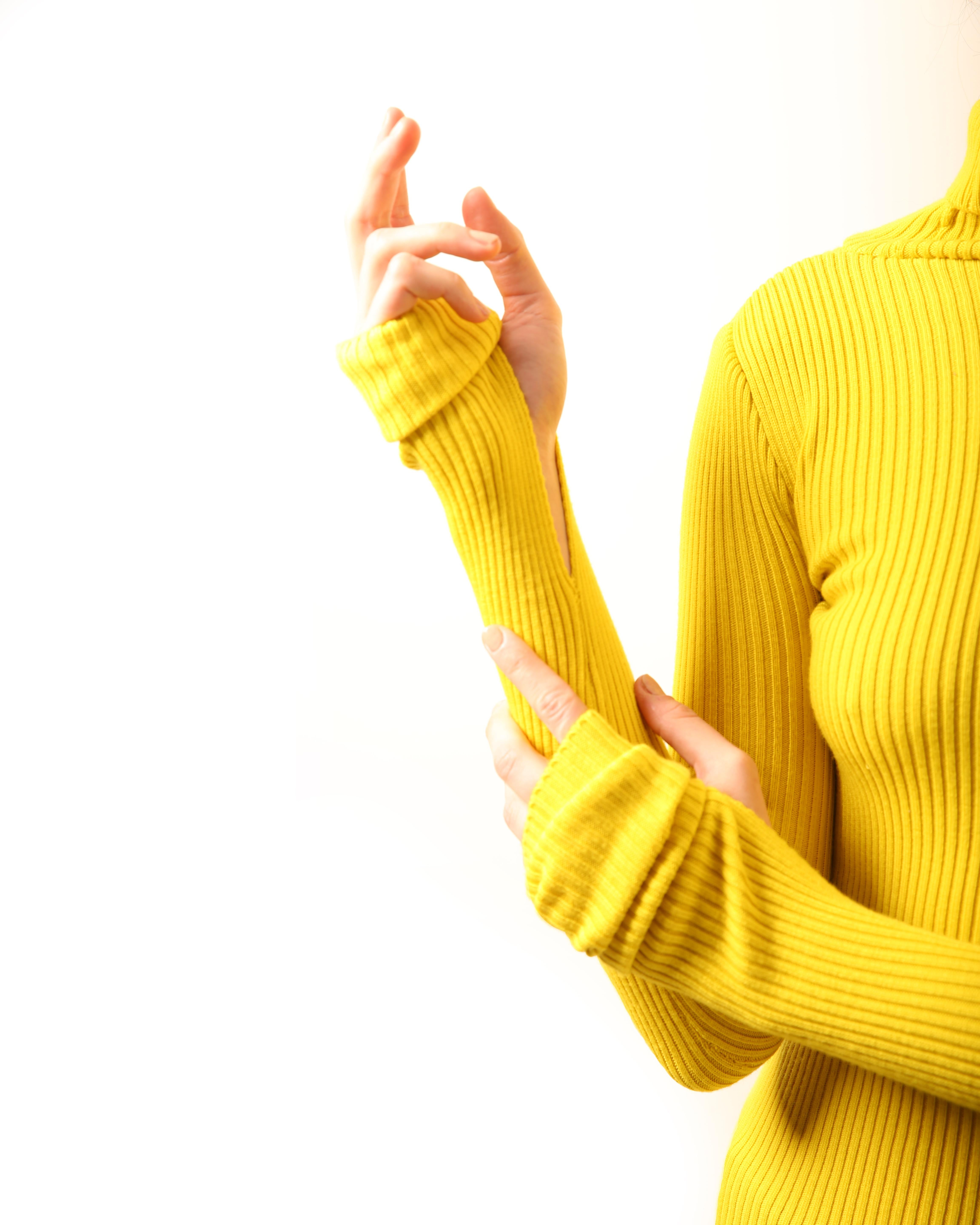 yellow and blue sweater