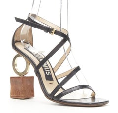 JACQUEMUS architectural wood block gold ring black strappy heel EU36