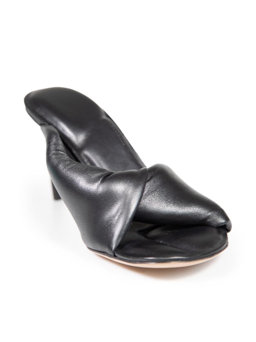 CONDITION is Very good. Minimal wear to mules is evident. Minimal abrasion to right side and left edge of left shoe as well as a scratch on left heel on this used Jacquemus designer resale item.
 
 
 
 Details
 
 
 Black
 
 Leather
 
 Mules
 
 Open