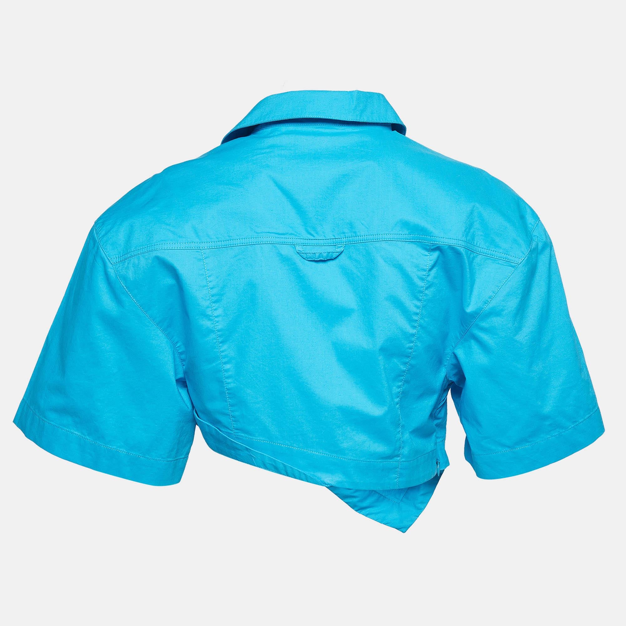 Crafted with precision this Jacquemus cropped shirt blends luxury and functionality effortlessly. Elevate your casual look with this fashion forward essential.