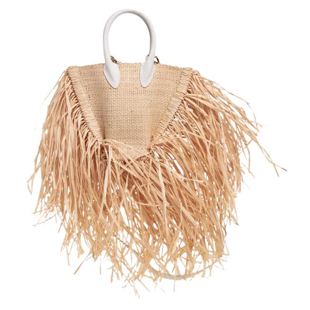 Whether it is a beach or vacation edit, Jacquemus' Let Petite Baci shoulder bag promises effortless style. Made of raffia and leather, the bag has exaggerated fringes, two shapely handles, a shoulder strap, and the logo at the front.

Includes: