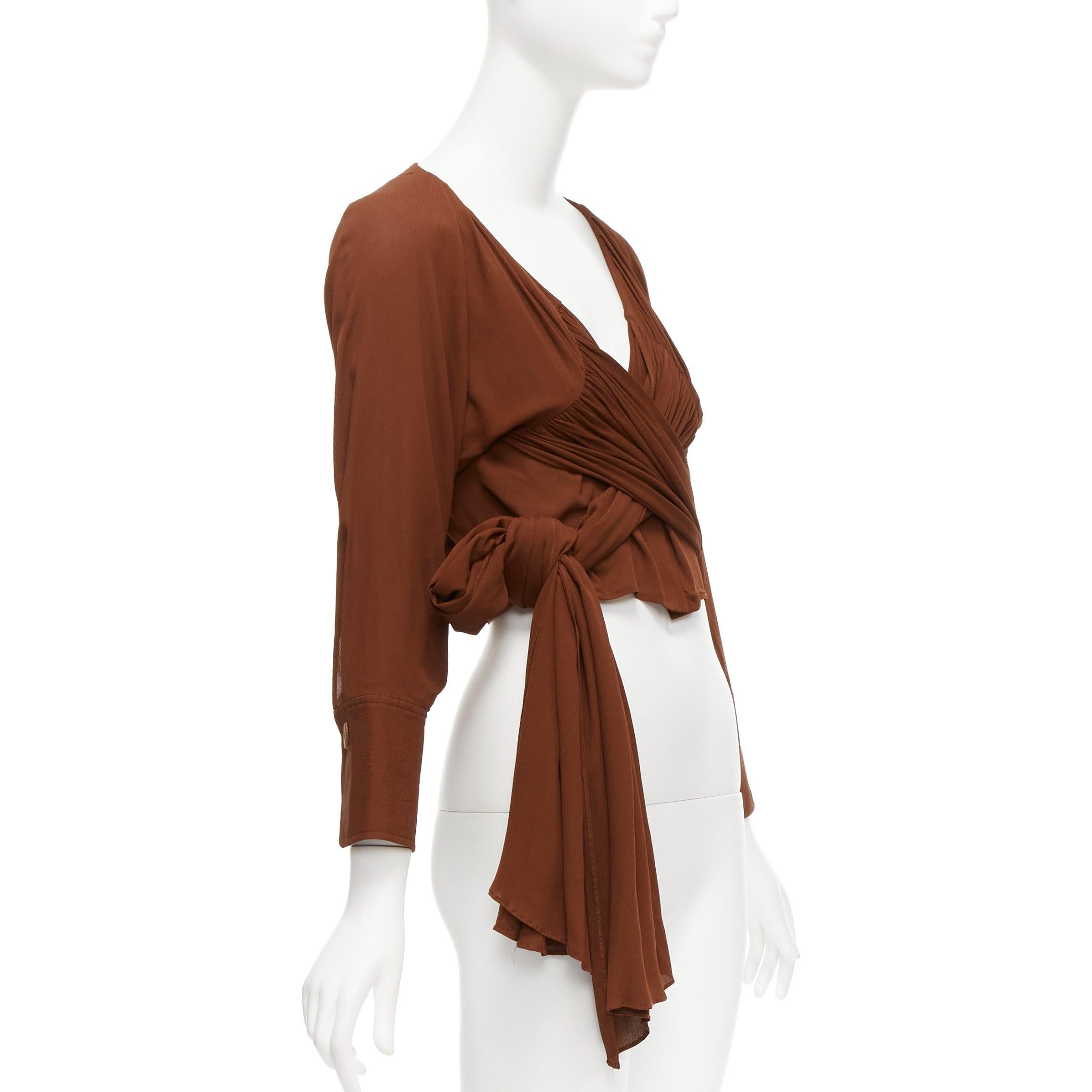 JACQUEMUS La Bomba brown viscose silky tie wrap crop shirt FR38 M
Reference: JACG/A00124
Brand: Jacquemus
Model: La Bomba
Material: Viscose
Color: Brown
Pattern: Solid
Closure: Wrap Tie
Extra Details: Wrap tie waist.
Made in: