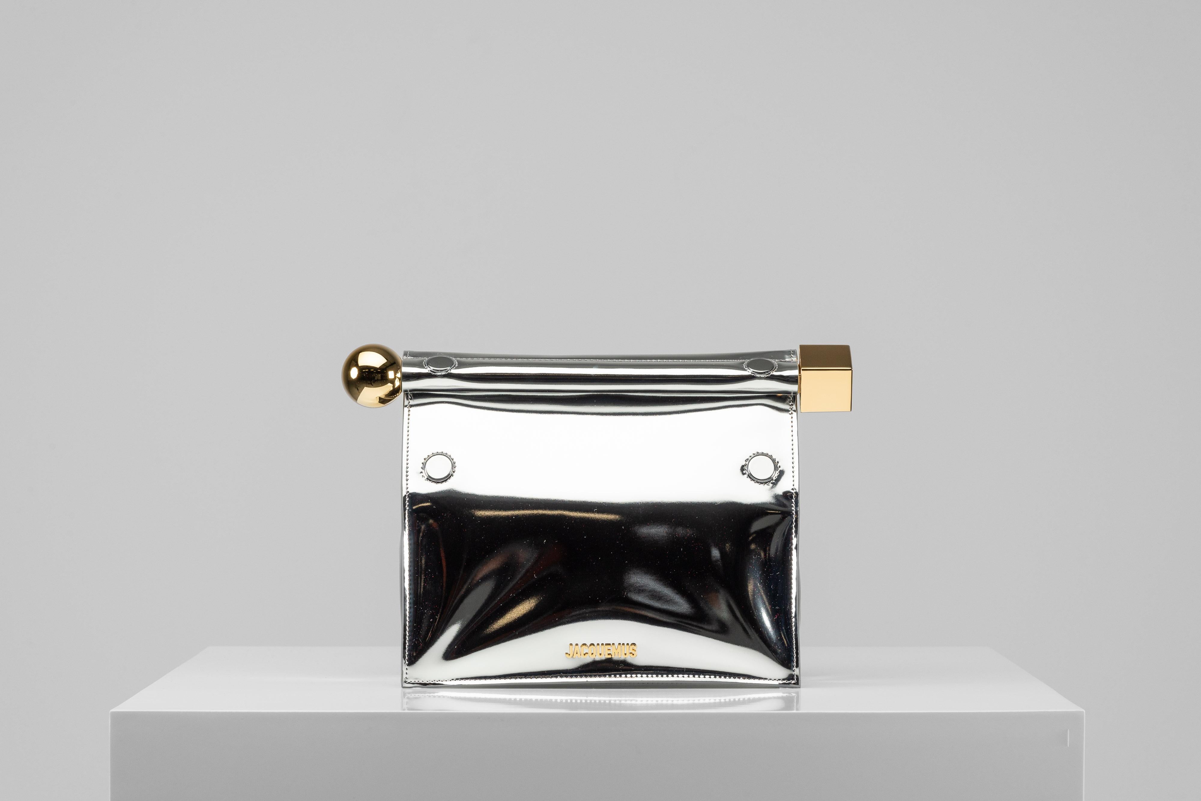 jacquemus silver and gold clutch