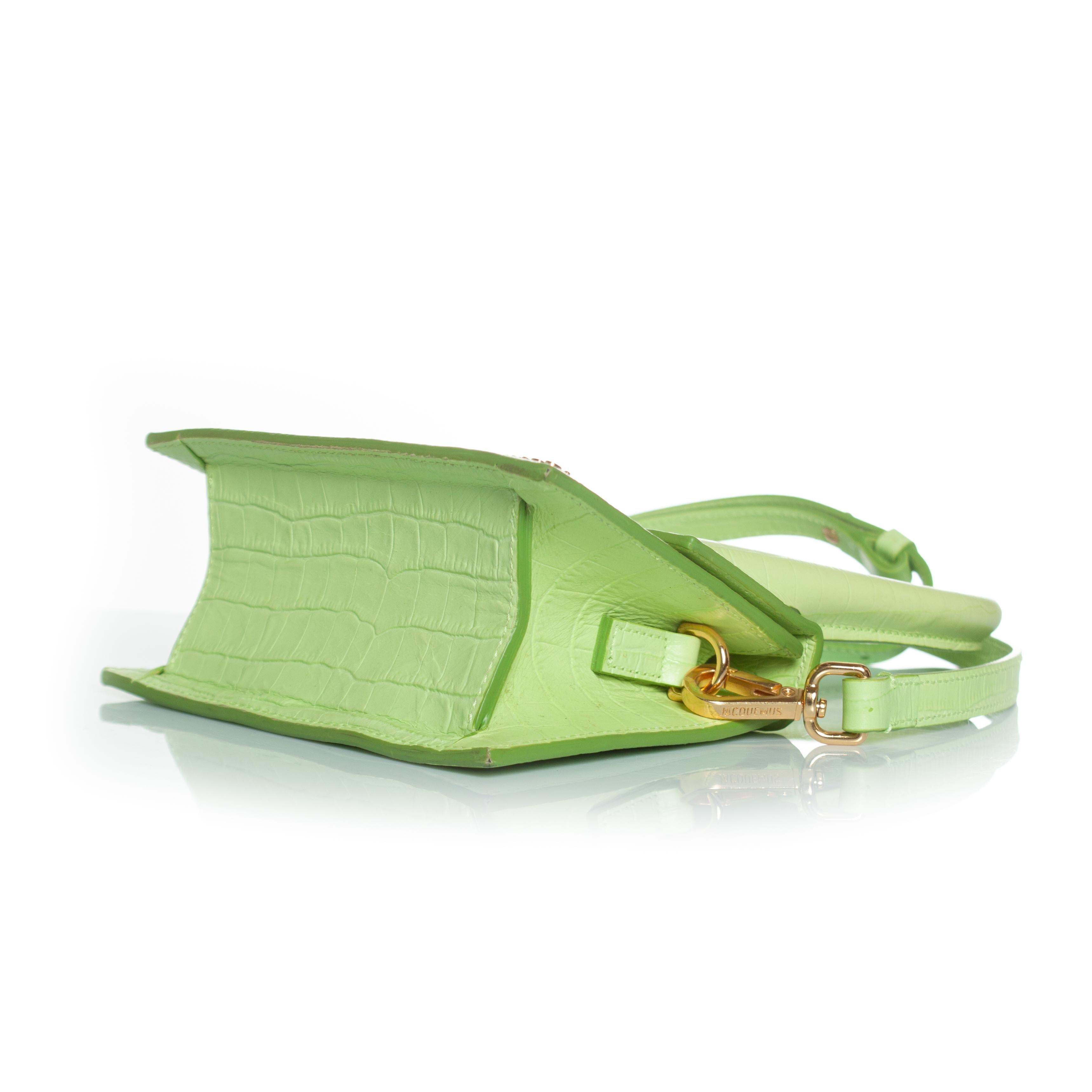 Jacquemus, le chiquito moyen bag in croc embossed leather. The item has a few spots and scratches, overall in good condition. Interior is in good condition.

CONDITION: good condition

SIZE: medium

MEASUREMENTS: height 13 cm, width 18 cm, depth 8