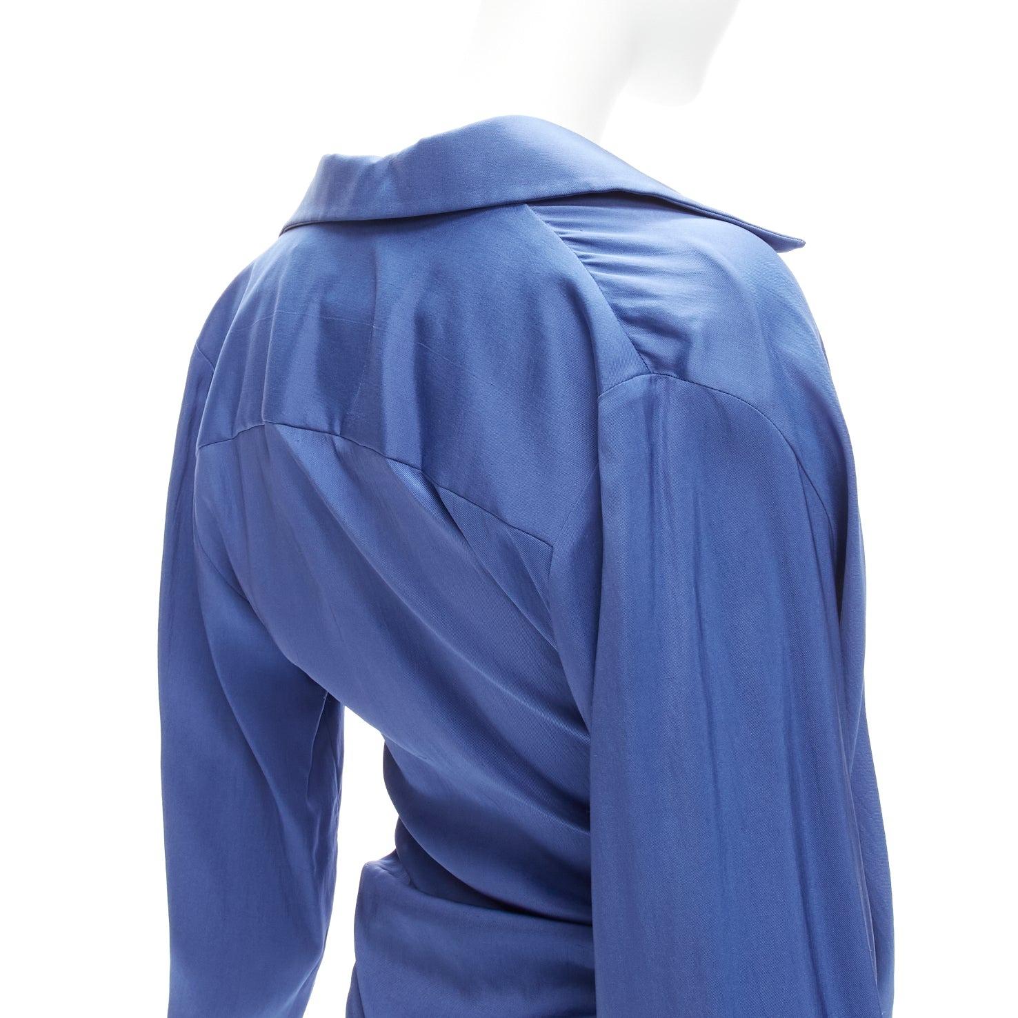 JACQUEMUS Le Collectionneuse blue plunge knot drape asymmetric blouse FR34 XS
Reference: JACG/A00122
Brand: Jacquemus
Model: Le Collectionneuse
Material: Viscose, Blend
Color: Blue
Pattern: Solid
Closure: Button
Extra Details: Knotted and button