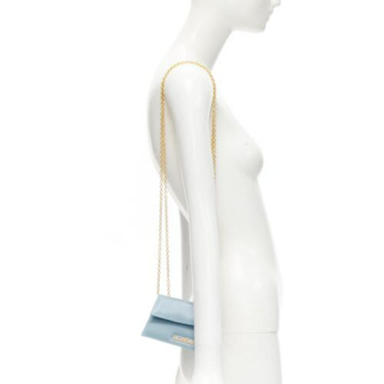 JACQUEMUS Le Piccolo blue leather gold chain boxy 2-way crossbody micro bag
Reference: AAWC/A00405
Brand: Jacquemus
Model: Le Piccolo
Material: Leather
Color: Blue, Gold
Pattern: Solid
Closure: Snap Buttons
Lining:  Fabric
Made in: