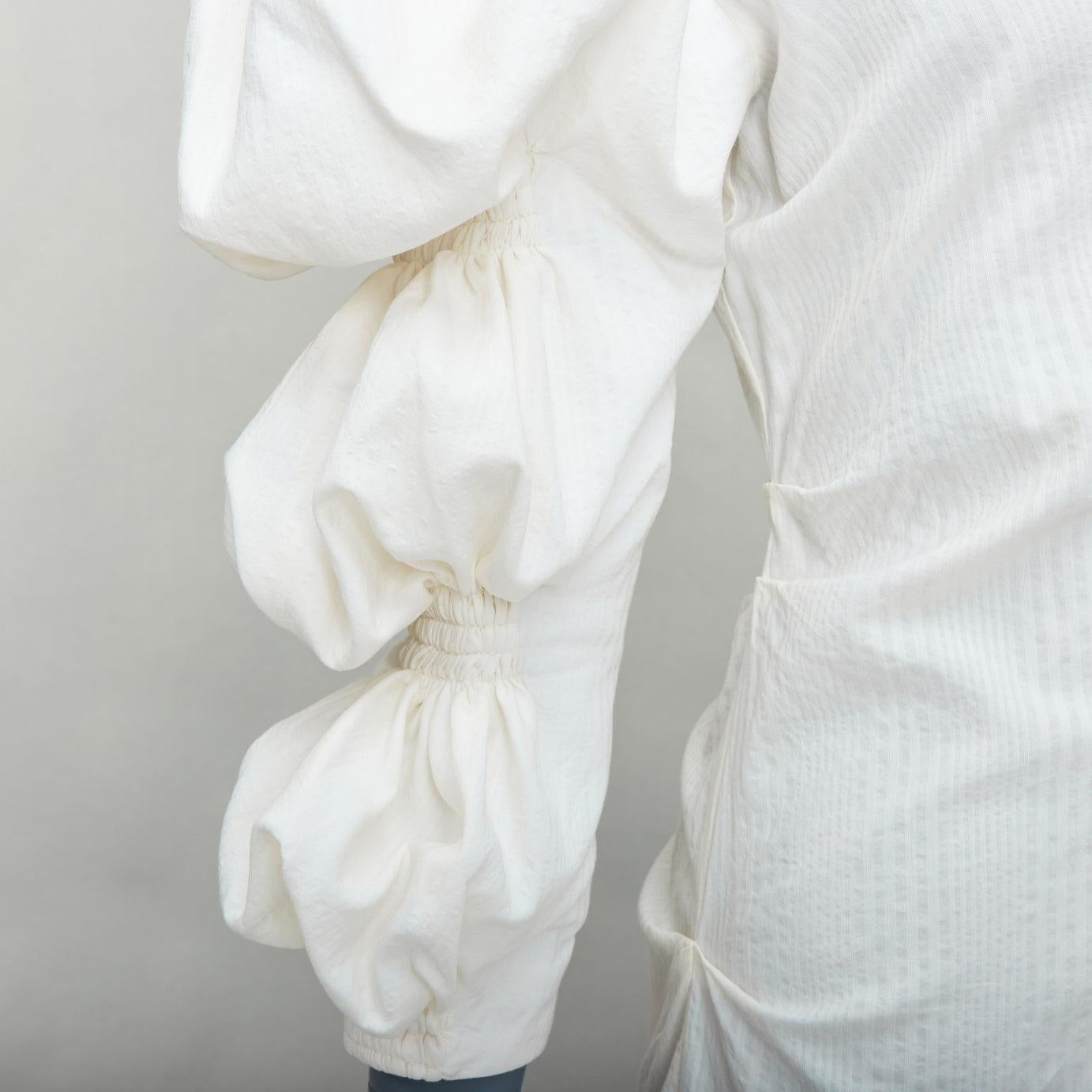 JACQUEMUS Les Robe Santon cream cotton puff sleeve mini dress FR34 XS
Reference: JACG/A00201
Brand: Jacquemus
Model: La Robe Santon
Collection: Les Santons De Provence
Material: Cotton
Color: Cream
Pattern: Striped
Closure: Zip
Extra Details: Soft