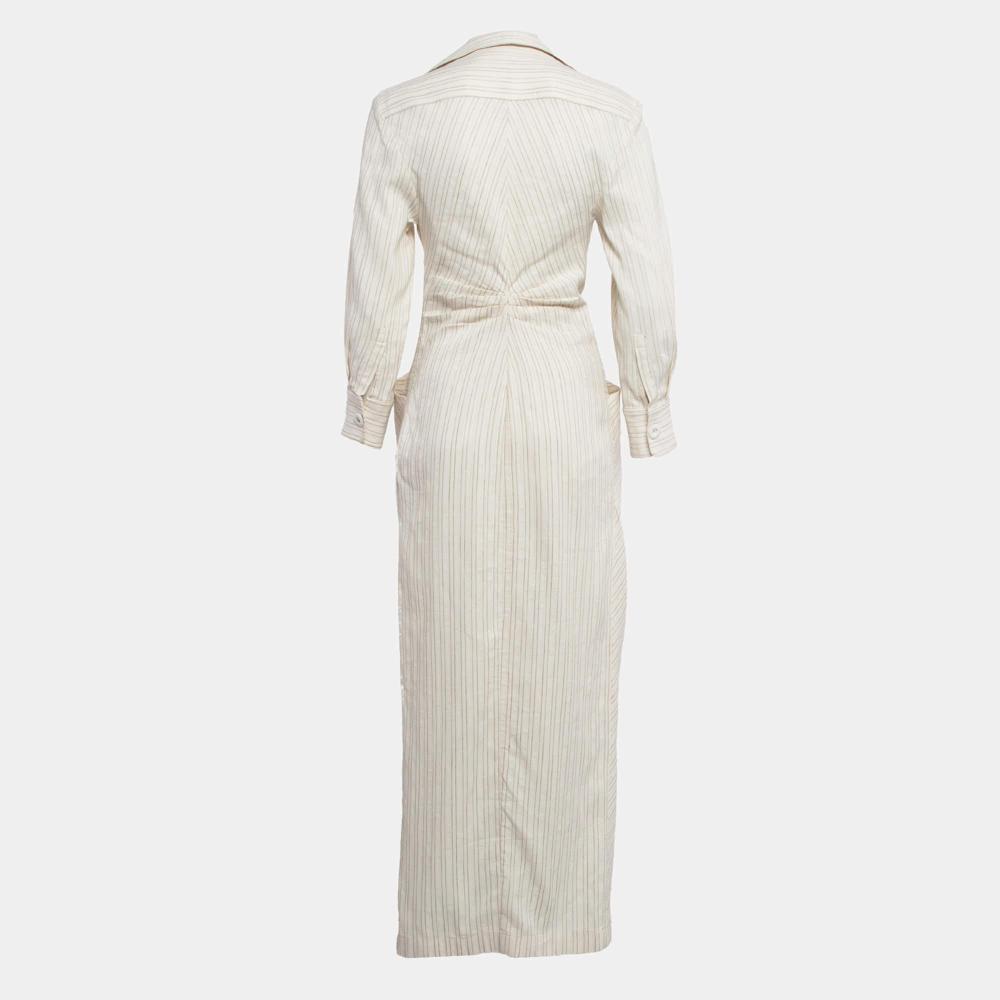 The Jacquemus La Bomba Dress is a chic blend of minimalism and French allure. Crafted from a linen blend this dress features a flattering pinstripe pattern and a sophisticated silhouette. Its airy fabric and timeless design make it a standout piece