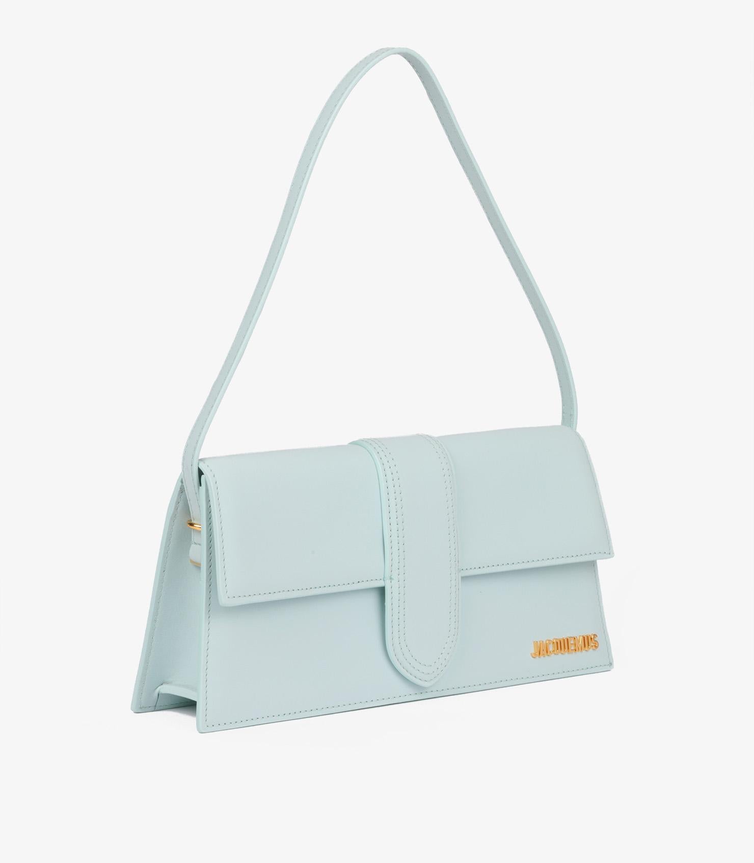 Jacquemus  Pale Blue Smooth Calfskin Leather Le Bambino Long 

Product Details
Xupes Ref: HB5395
Brand: Jacquemus 
Model: Le Bambino Long 
Type: Top Handle, Shoulder
Age: 2023
RRP: £740
Colour: Pale Blue
Hardware: Gold
Material(s): Calfskin