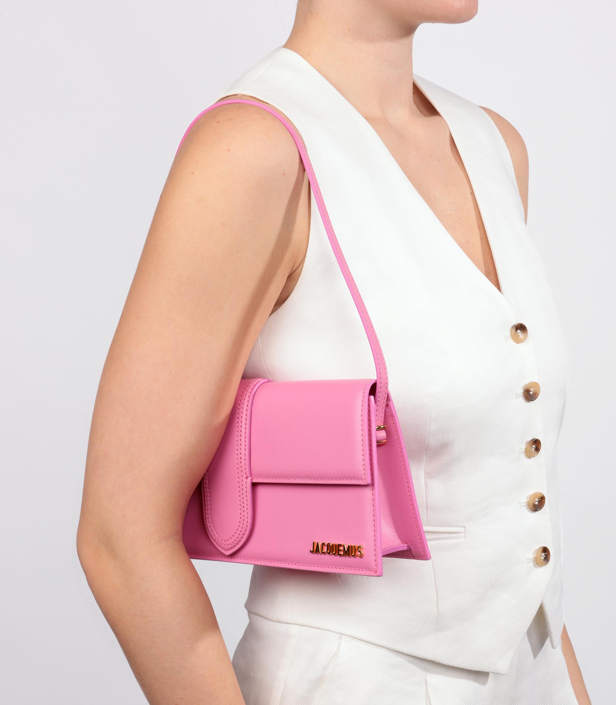Jacquemus  Pink Smooth Calfskin Leather Le Bambino Long 

Product Details
Xupes Ref: HB5391
Brand: Jacquemus 
Model: Le Bambino Long 
Type: Top Handle, Shoulder
Age: 2023
RRP: £740
Colour: Pink
Hardware: Gold
Material(s): Calfskin