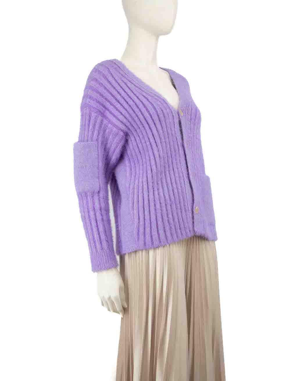 CONDITION is Very good. Hardly any visible wear to cardigan is evident on this used Jacquemus designer resale item.
 
 
 
 Details
 
 
 Model: Le Cardigan Neve
 
 Purple
 
 Viscose
 
 Knit cardigan
 
 V-neck
 
 Button up fastening
 
 Long sleeves
 
