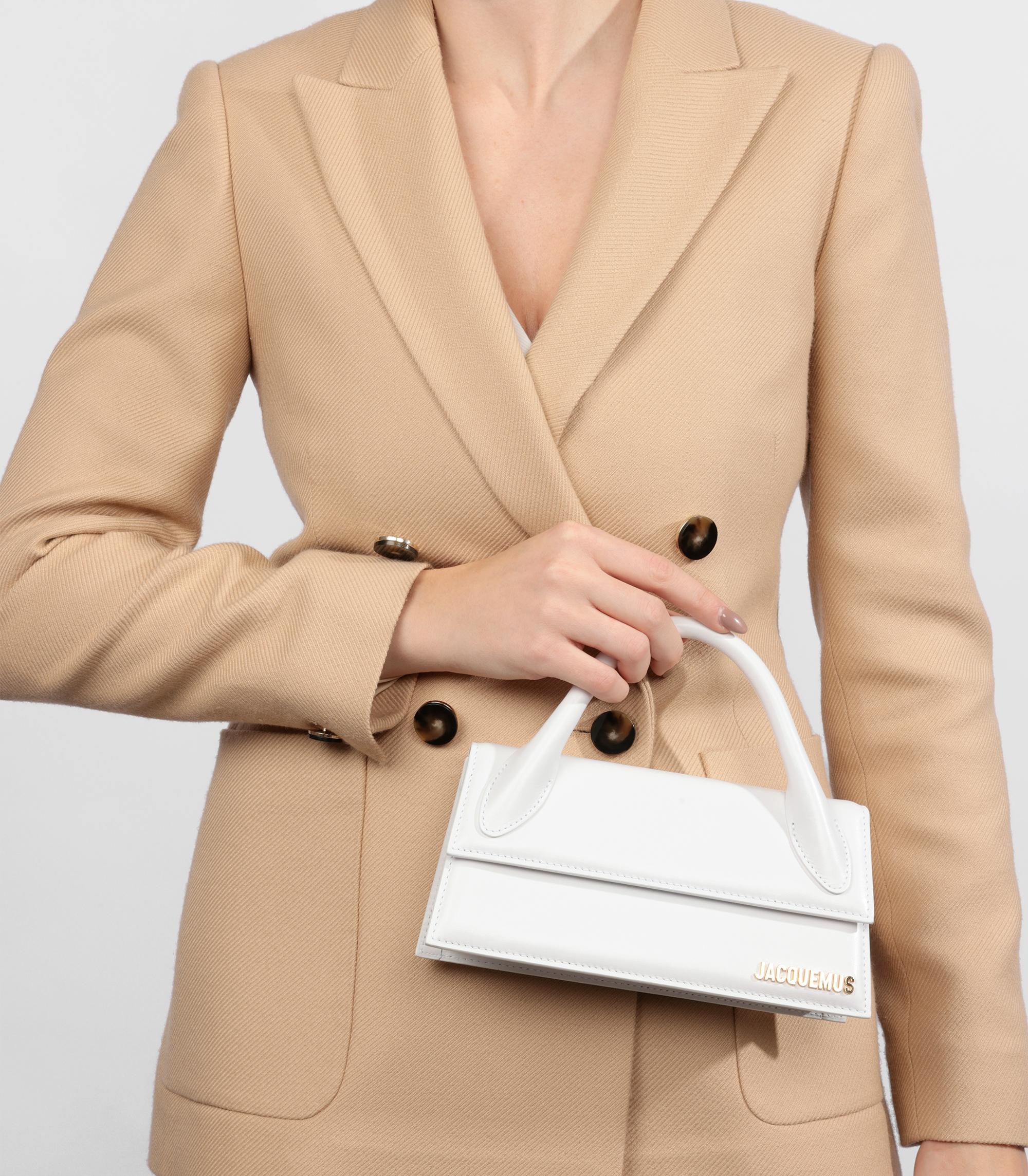 Jacquemus White Smooth Calfskin Leather Le Chiquito Long

Brand- Jacquemus
Model- Le Chiquito Long
Product Type- Crossbody, Shoulder, Top Handle
Age- Circa 2023
Accompanied By- Jacquemus Dust Bag, Shoulder Strap
Colour- White
Hardware-