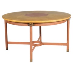 Jacques Adnet (1900-1984), Dining table with a circular sycamore veneer top.