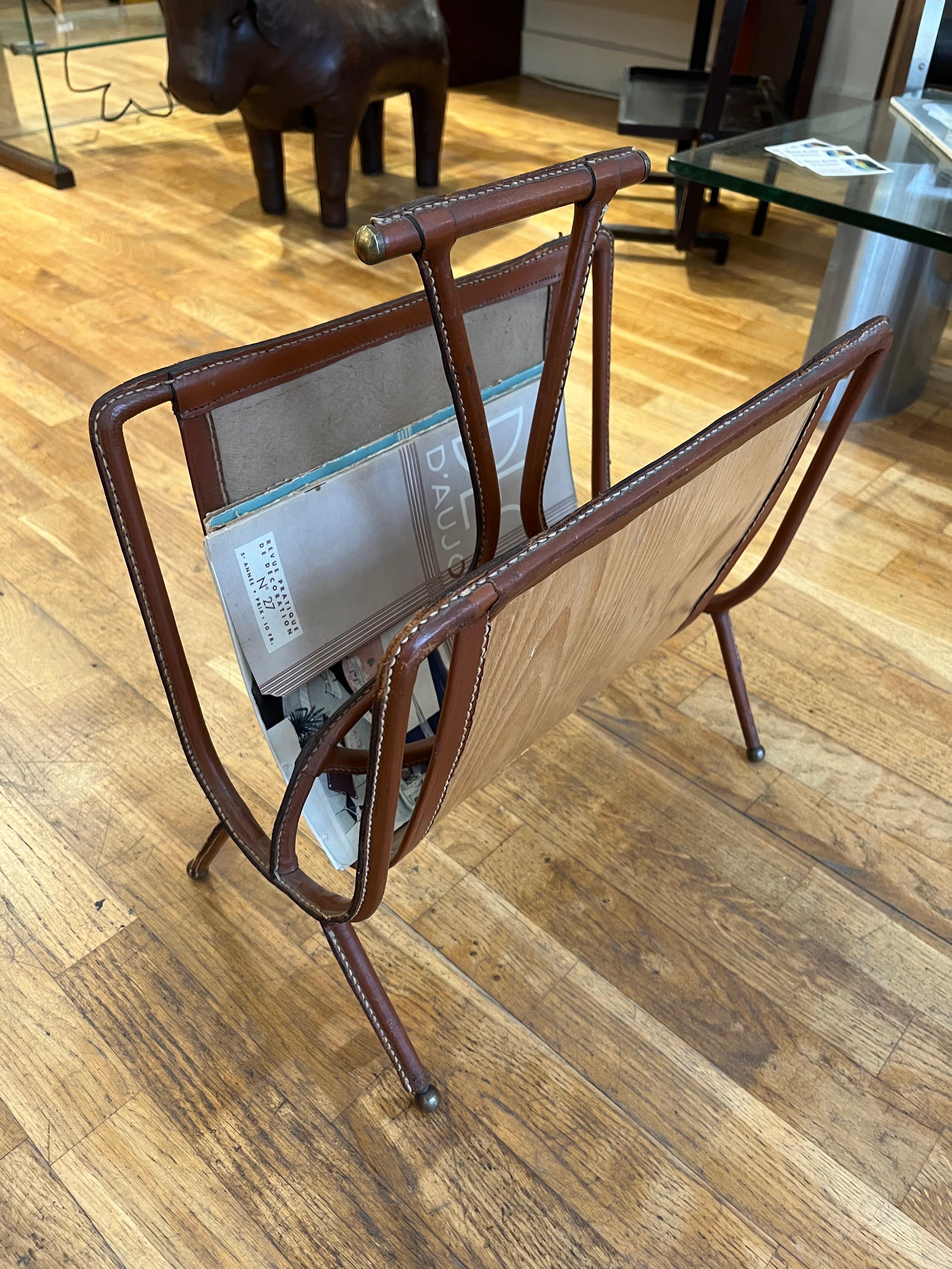 French Jacques ADNET (1900-1984) Magazine rack with a metal structure